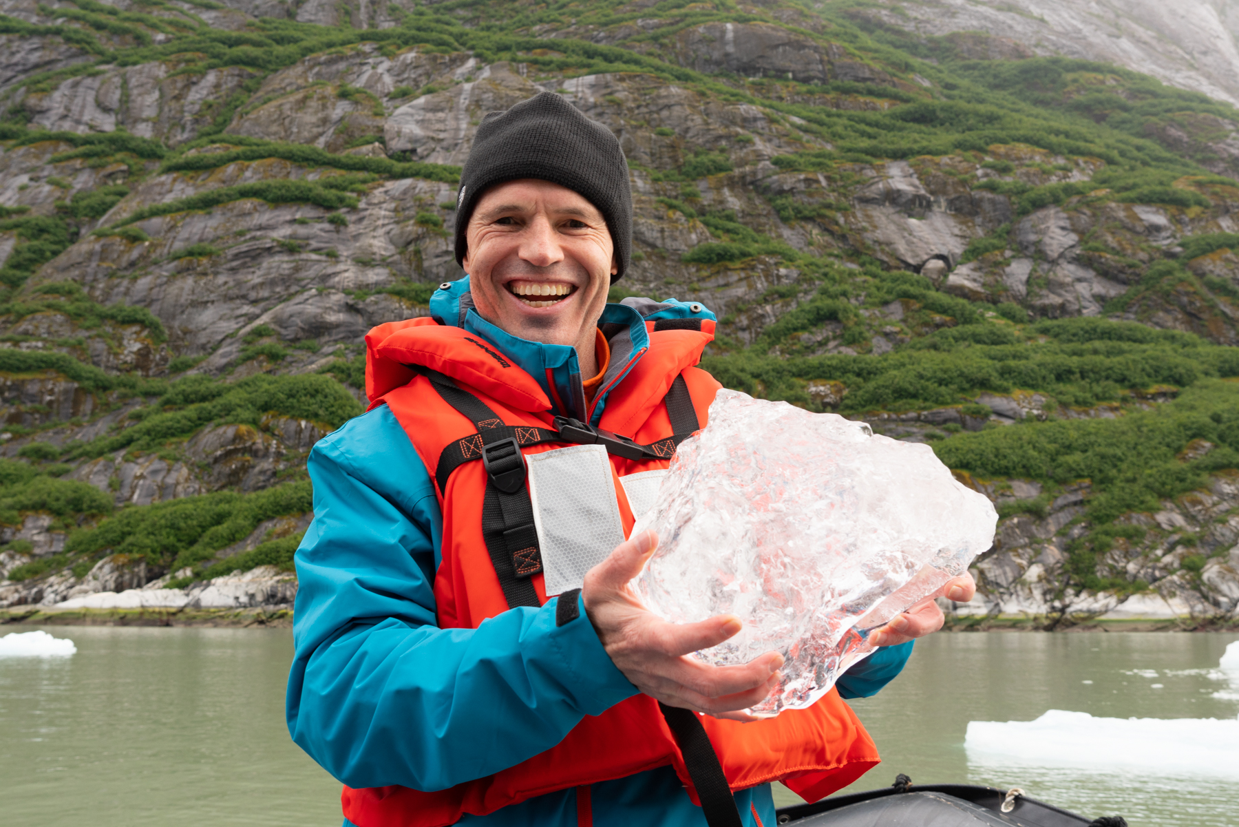 Keith holding a piece of pure ice, possibly hundreds of years old.