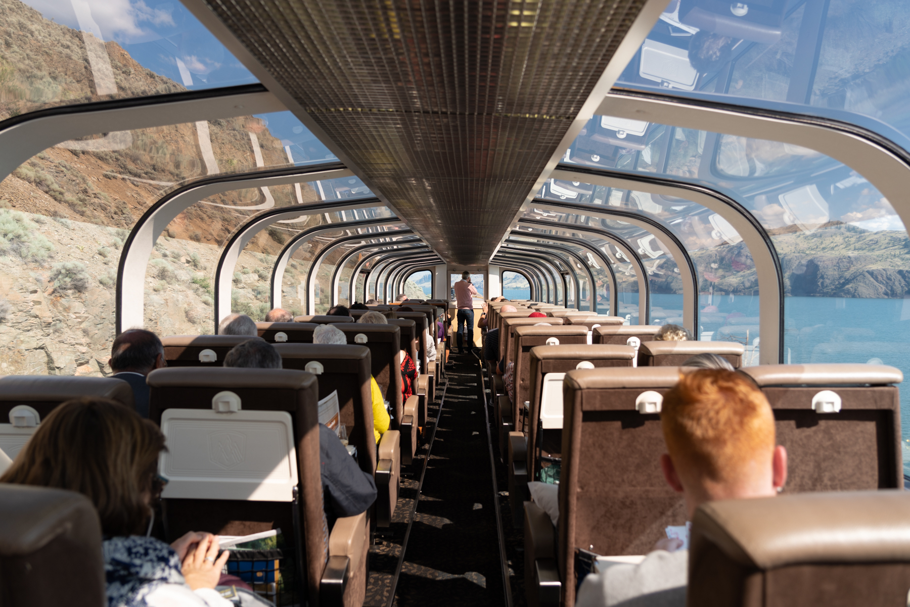 Keith taking a photo as the Rocky Mountaineer tracks along the Kamloops Lake.