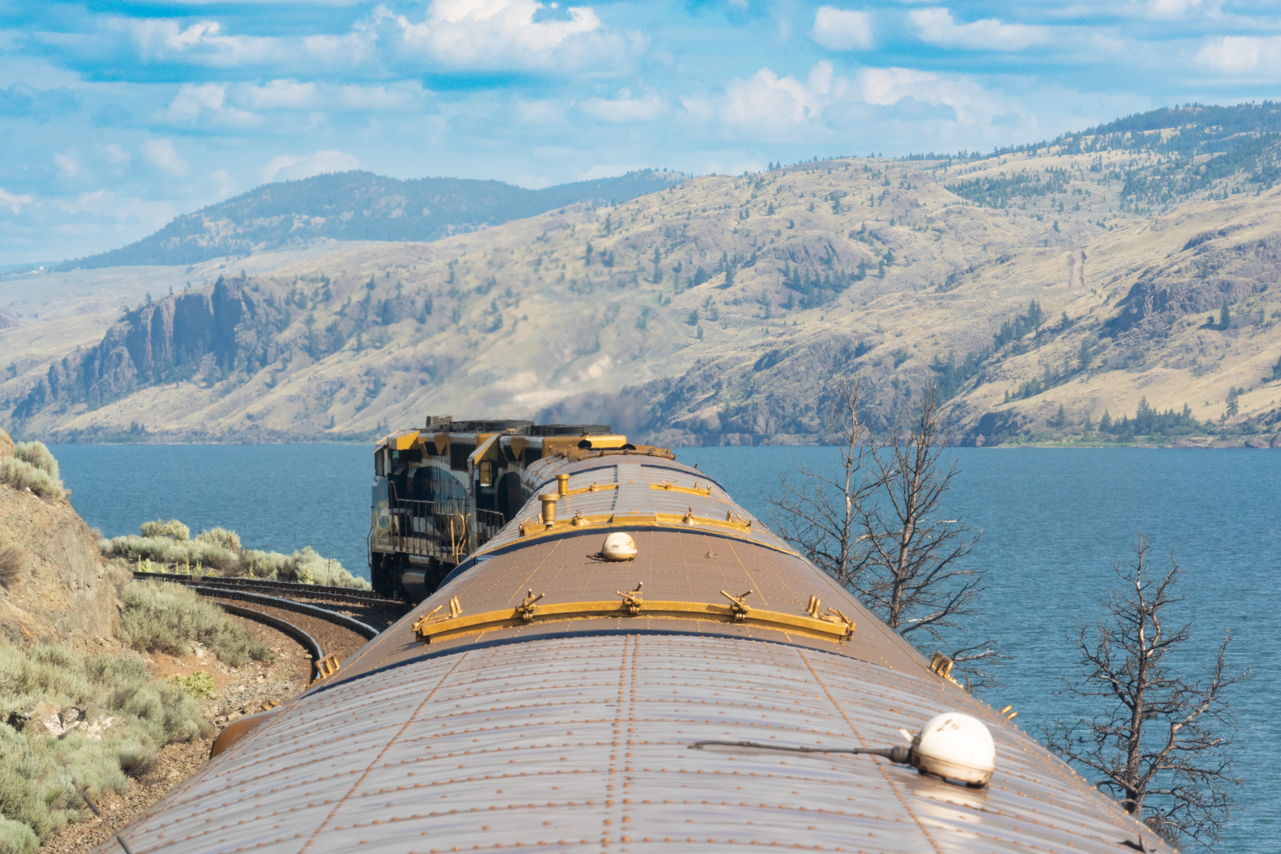 Rounding a bend on the Rocky Mountaineer along the Kamloops Lake.