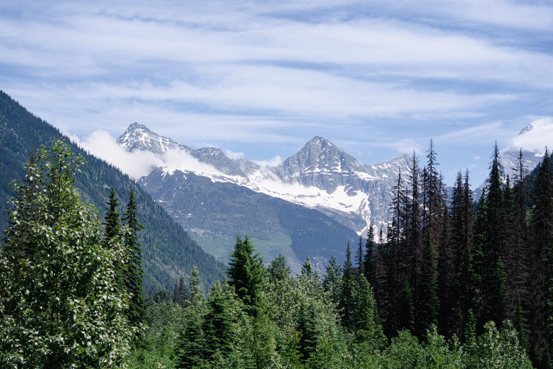 The view to glaciated peaks of the Hermit Range as the Rocky Mountaineer passes through the Rogers Pass.