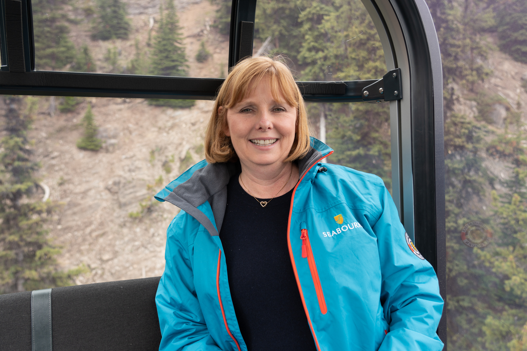Andrea riding the Banff gondola.