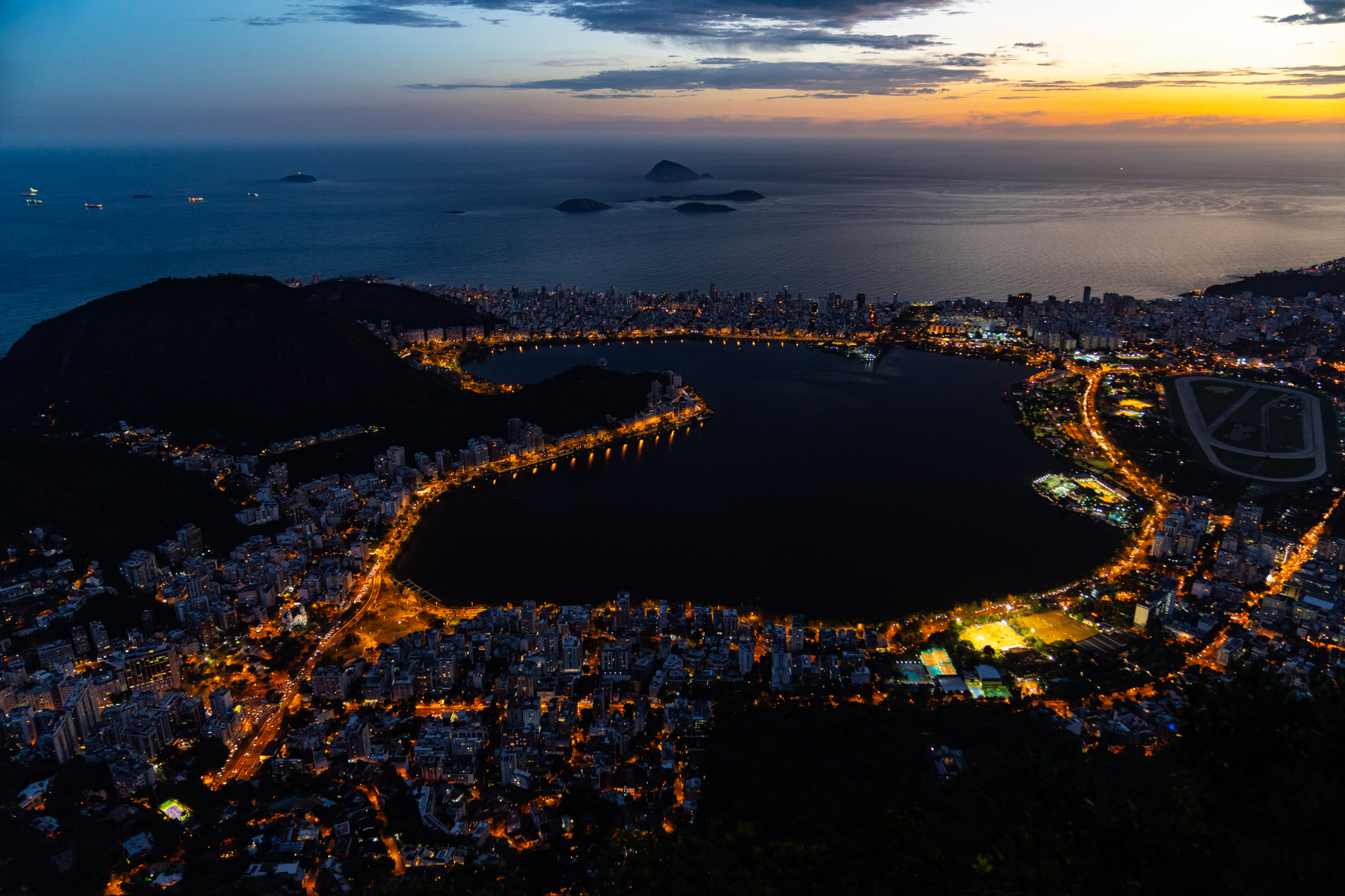 The view of Rio de Janeiro at night from the top of Corcovado.