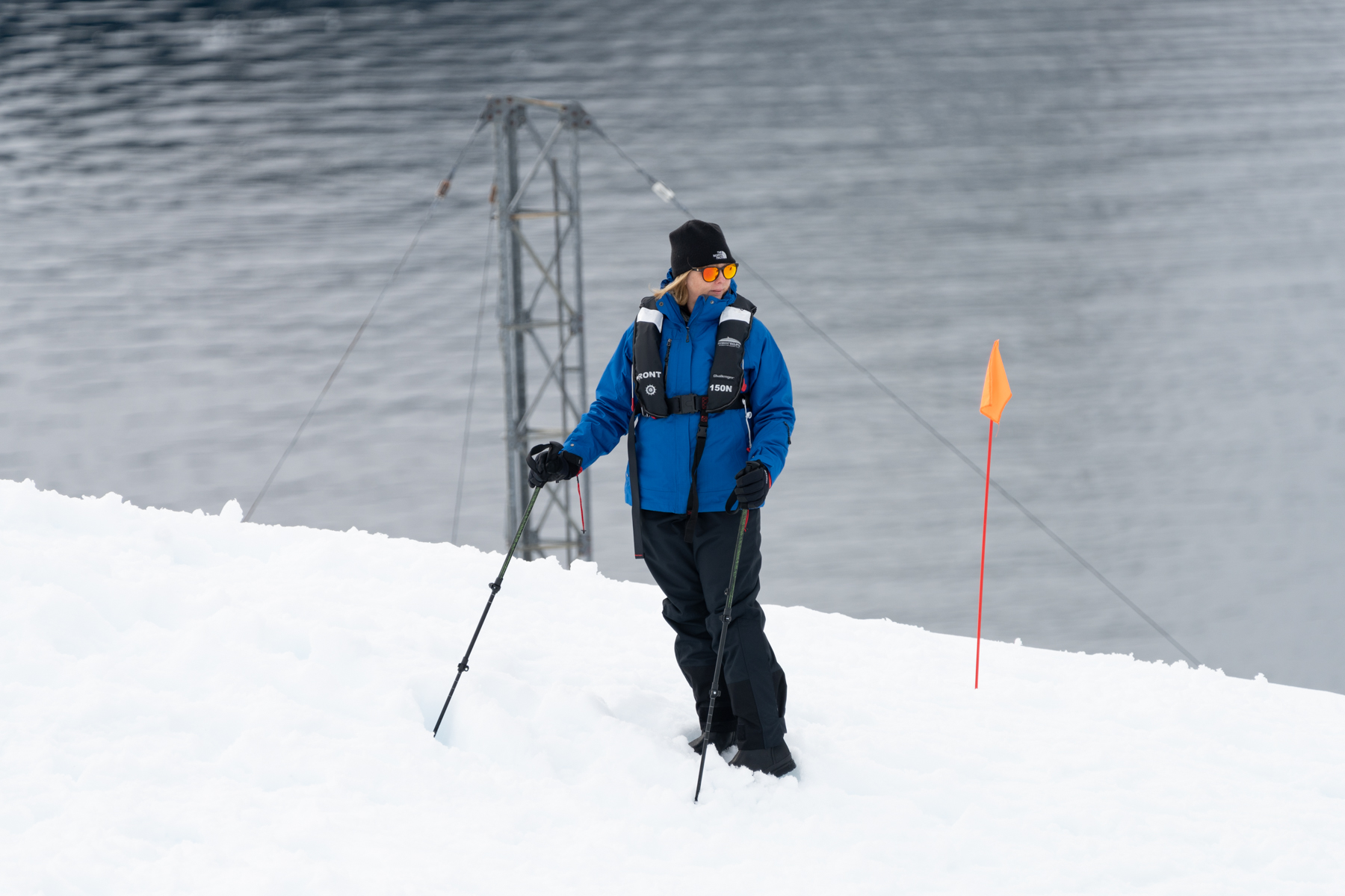 Andrea climbing the hill to get a view of Paradise Bay.