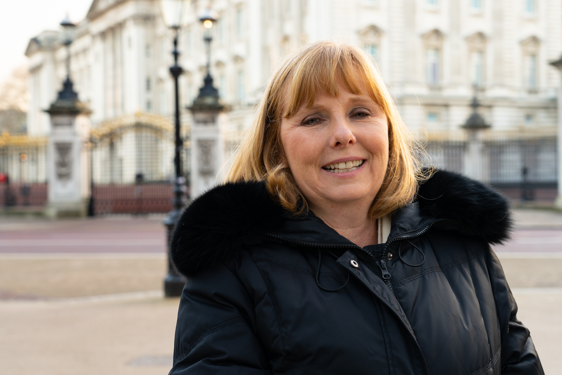 Andrea outside Buckingham Palace.