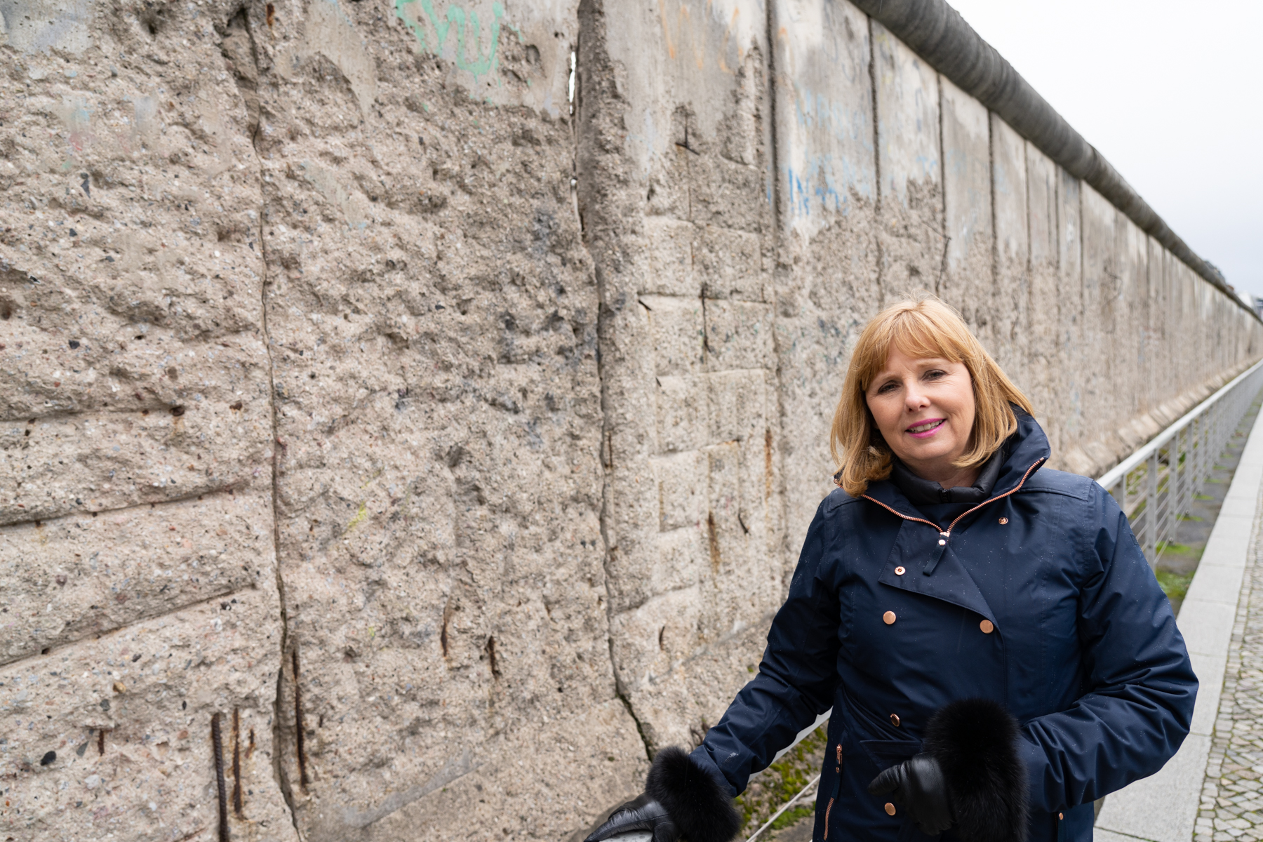 Andrea at the Berlin Wall.