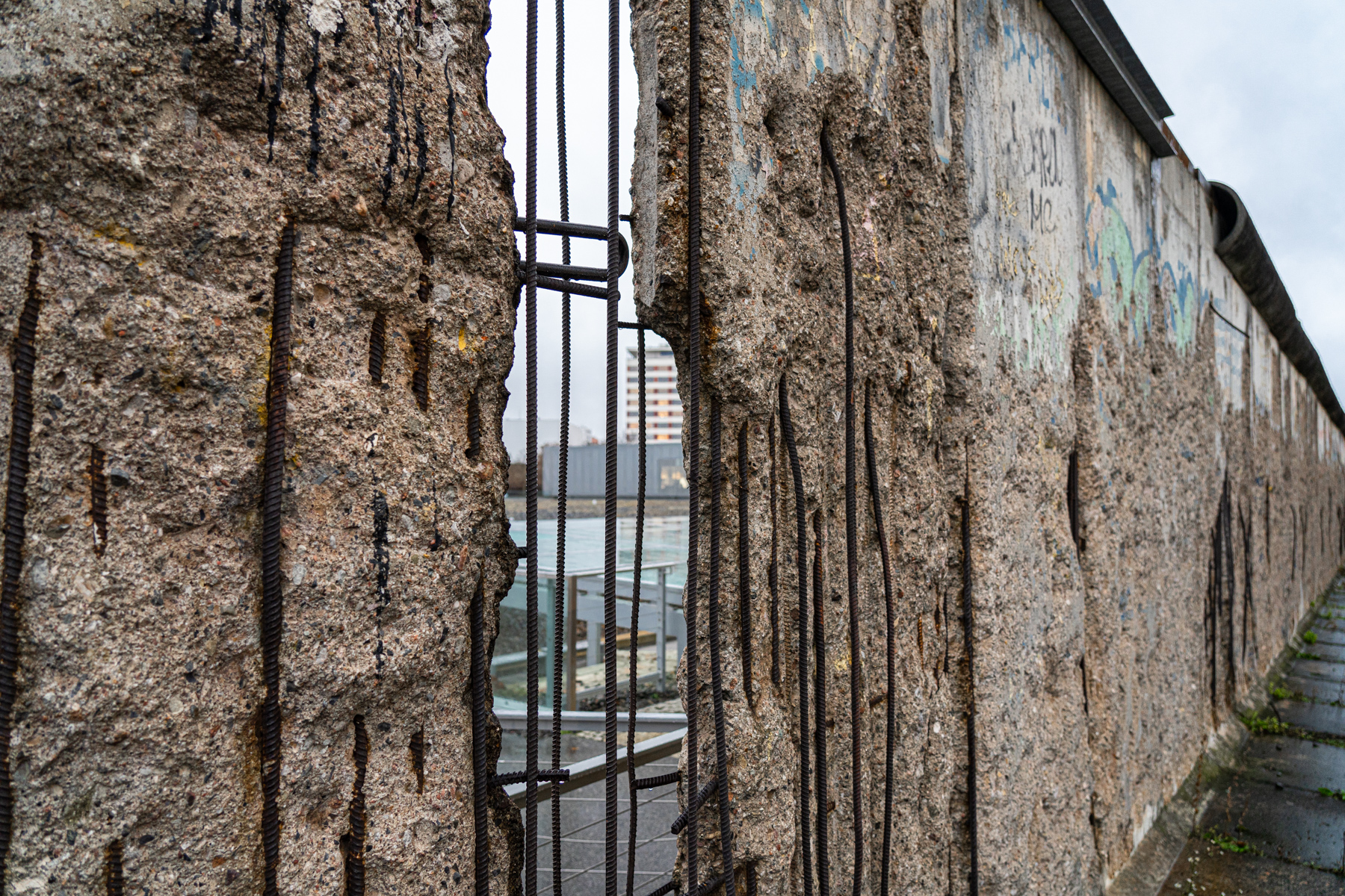 Looking back at the Topographie des Terrors through a gap in the Berlin Wall.