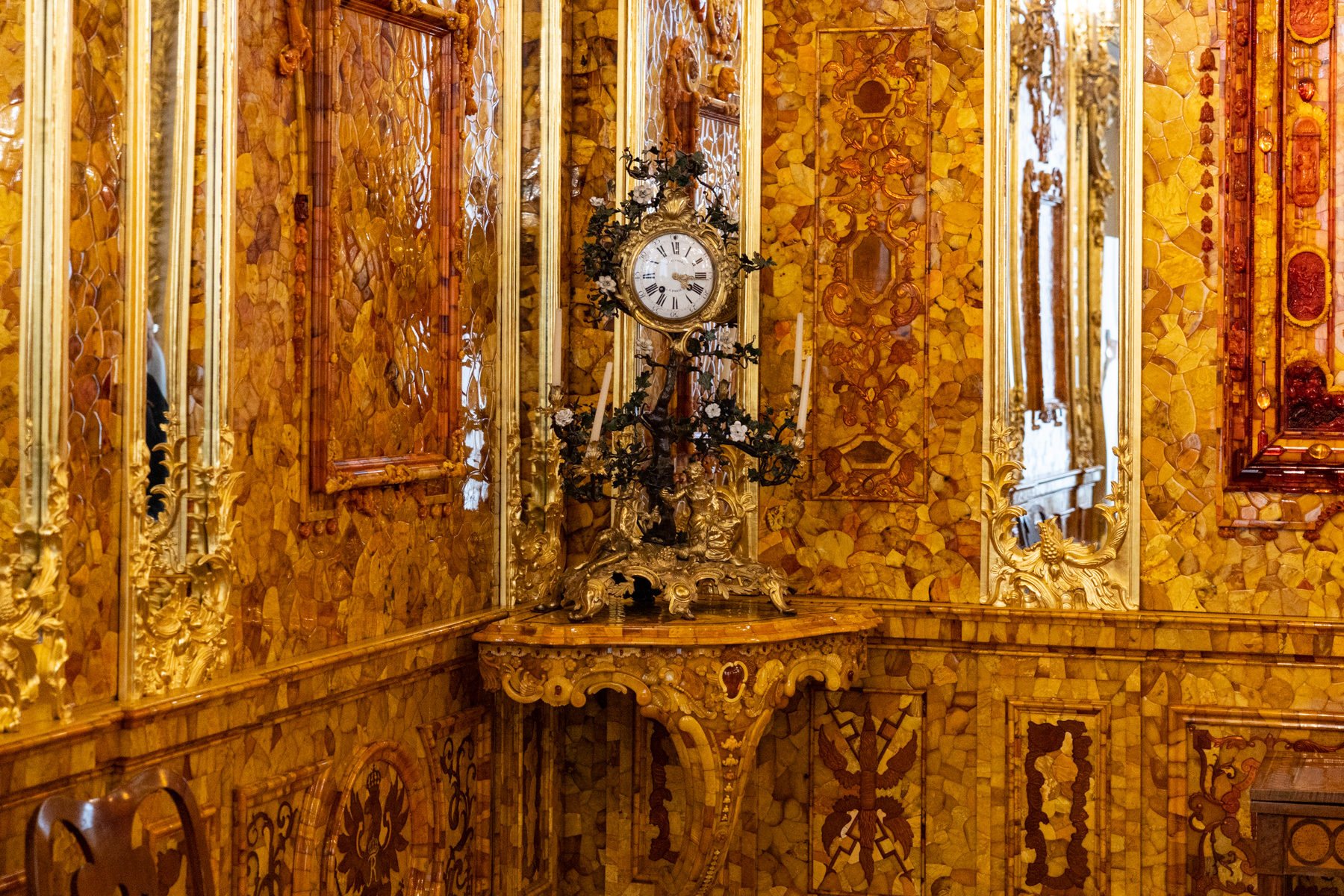 In the Amber Room inside the Catherine Palace.