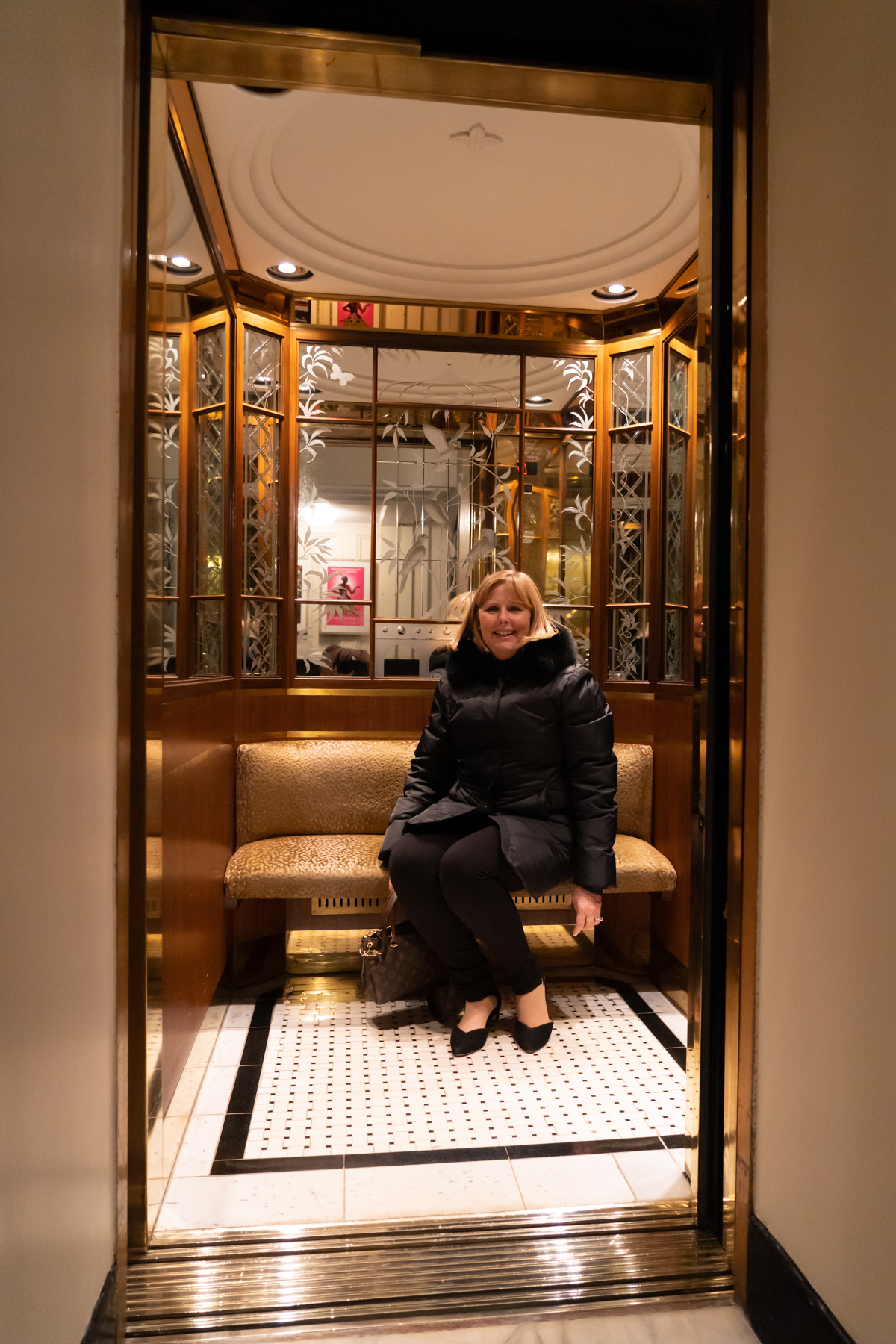 Andrea in the elevator at Claridge's.