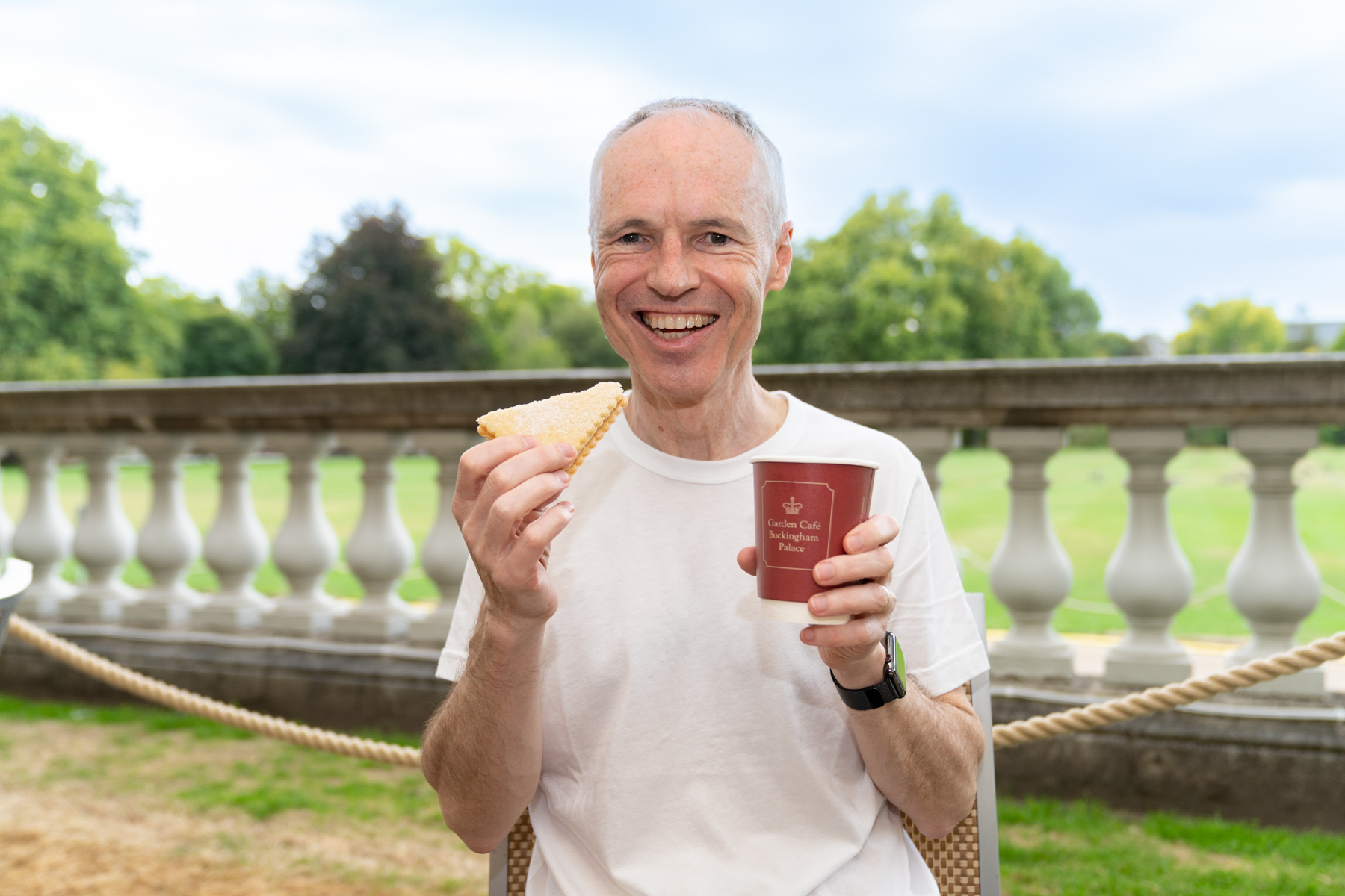 Keith enjoying a cup of tea and a piece of shortbread marmalade sandwich.