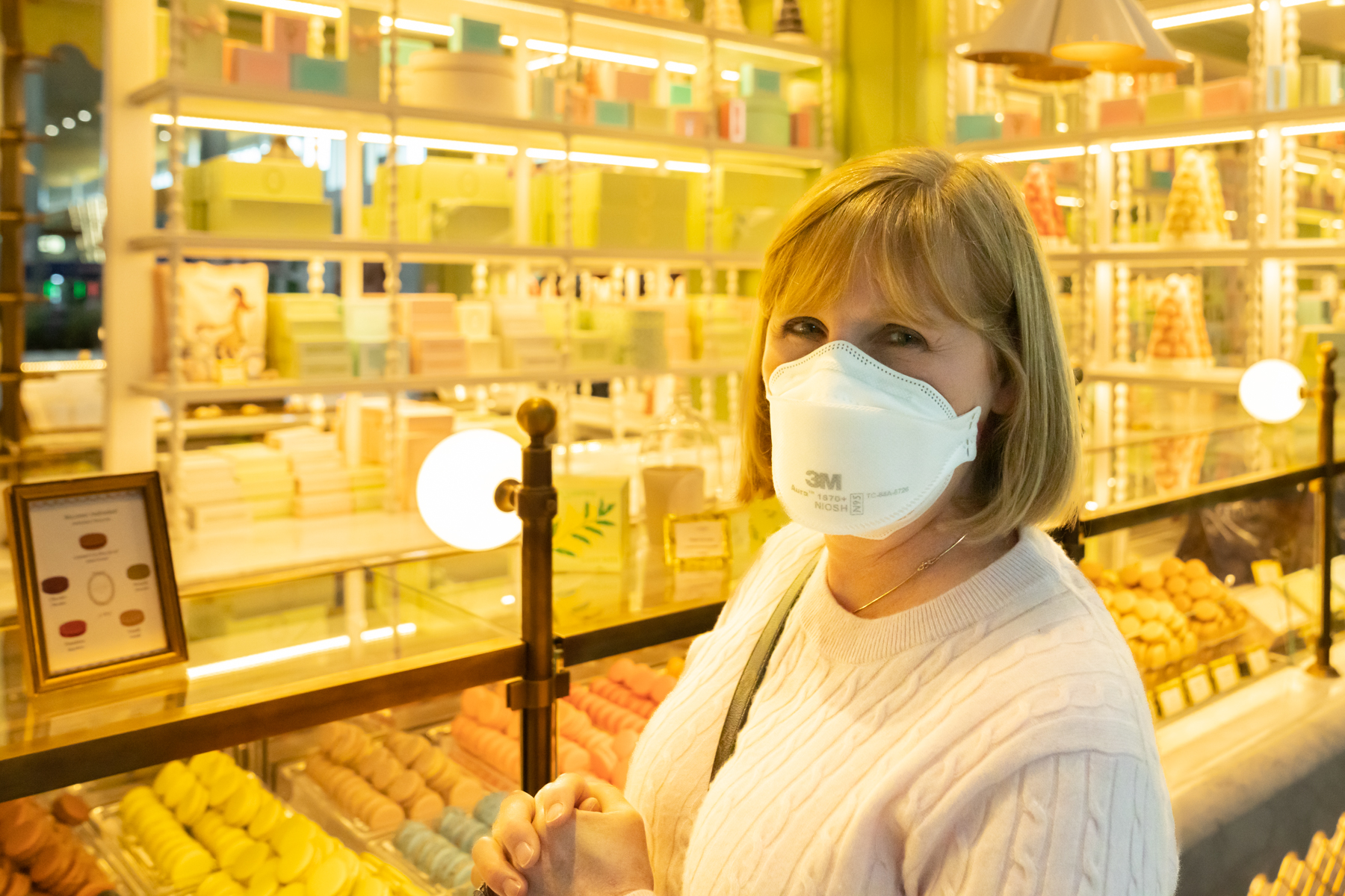 Andrea buying macarons.