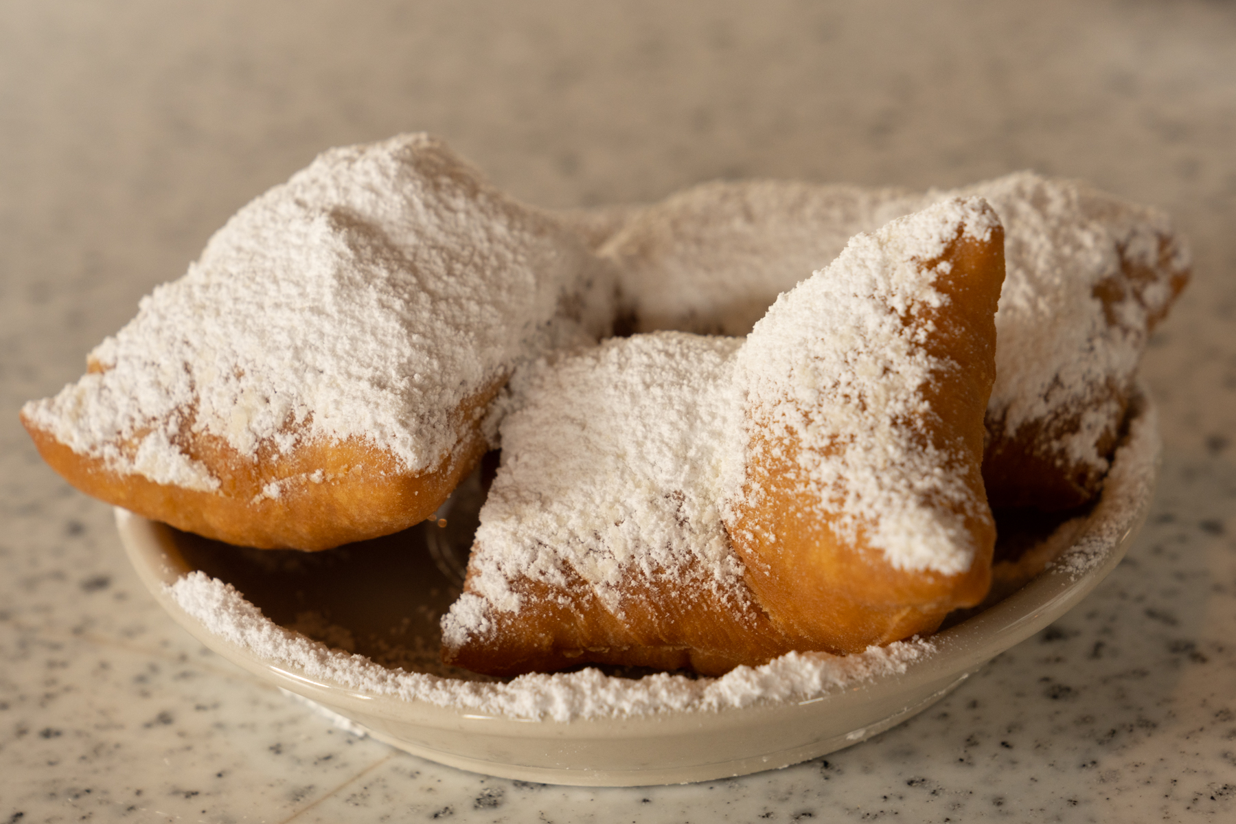 A plate of beignets.