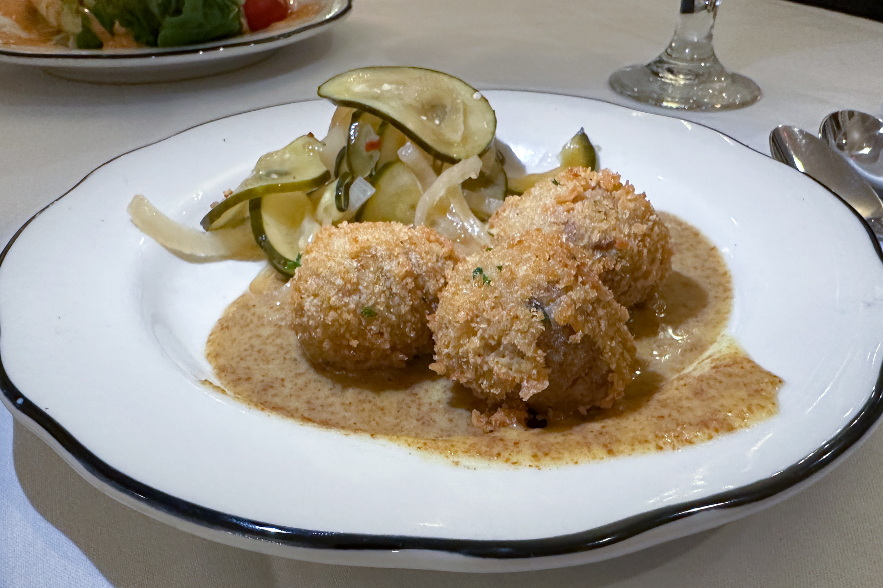 Boudin balls (fried Cajun appetizers made with spicy pork, chicken livers, rice, and a lot of spices!).