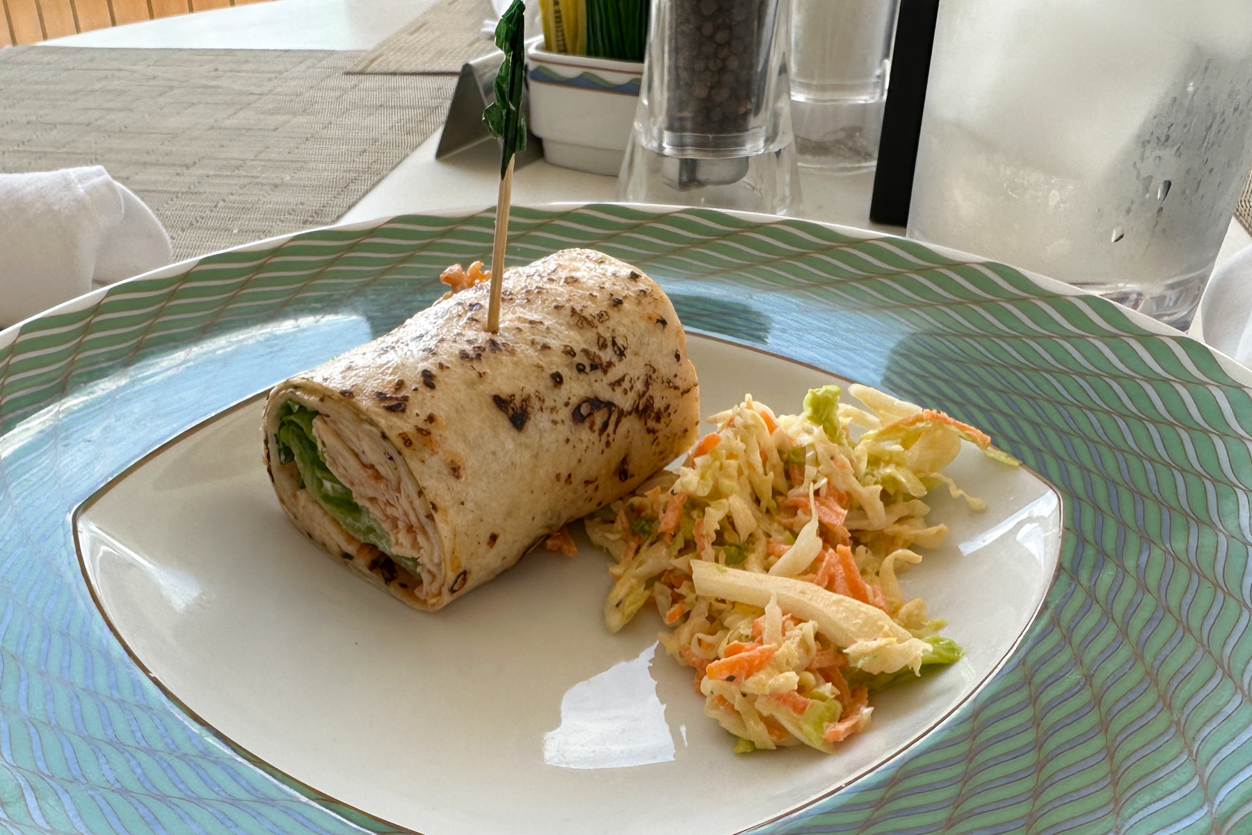 Pulled chicken wrap and salad.