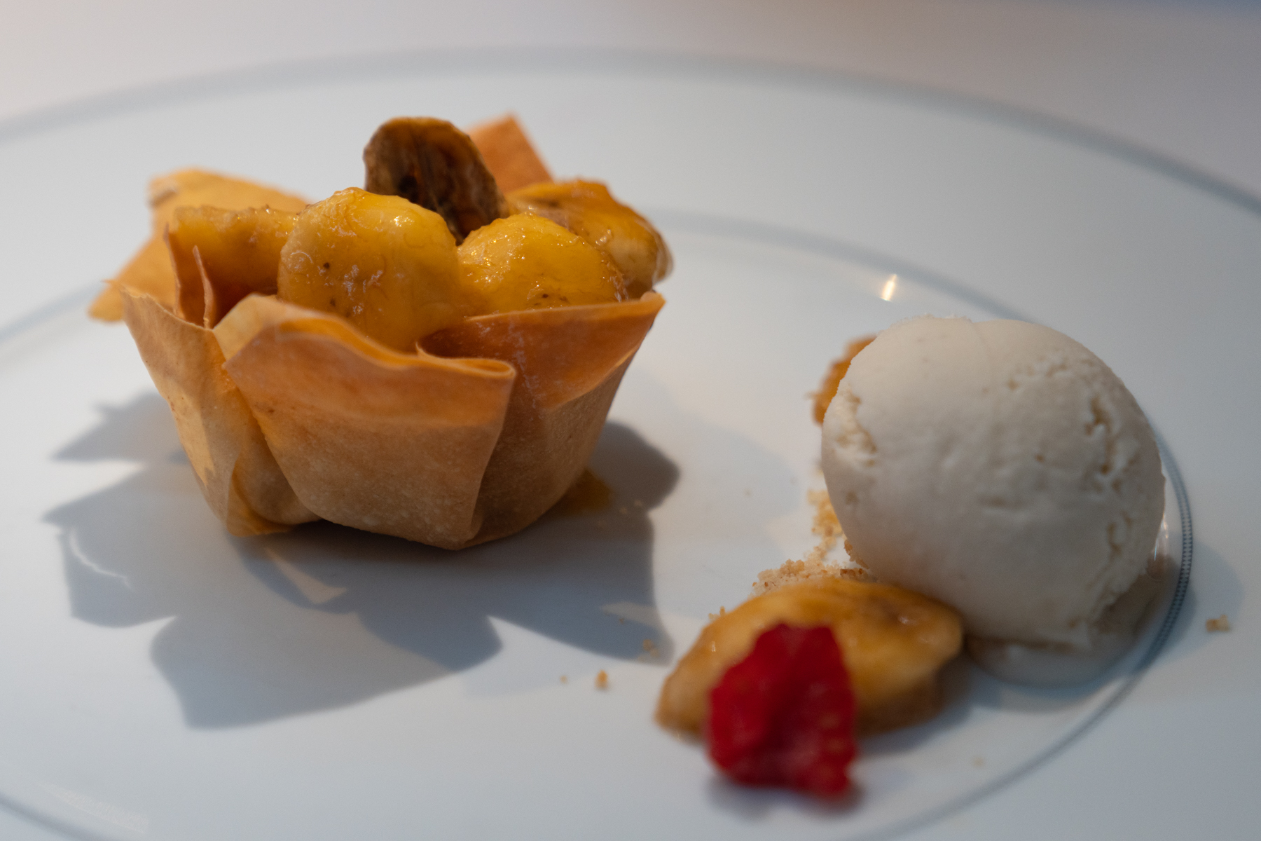 Caramelised banana in crispy phyllo, with cashew and vanilla ice-cream.