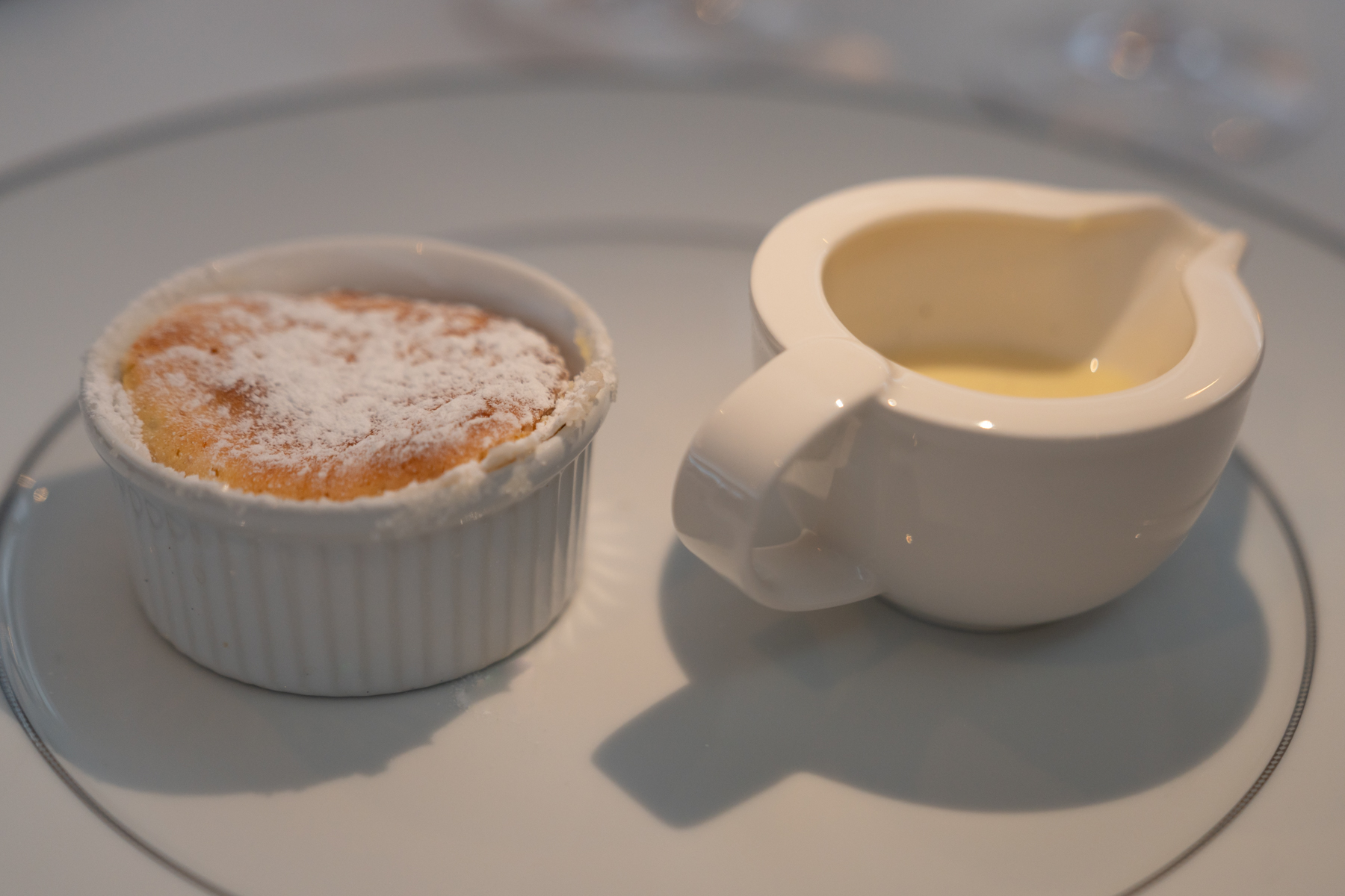 Grand Marnier soufflé with orange and vanilla sauce.
