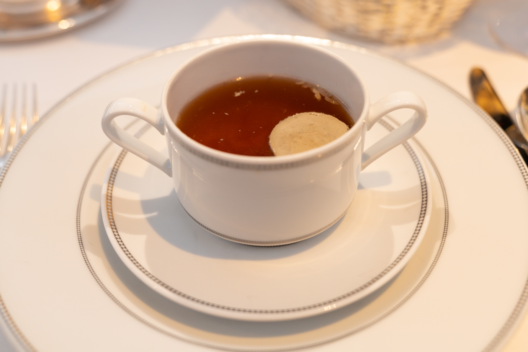 Chicken consommé Milanaise.