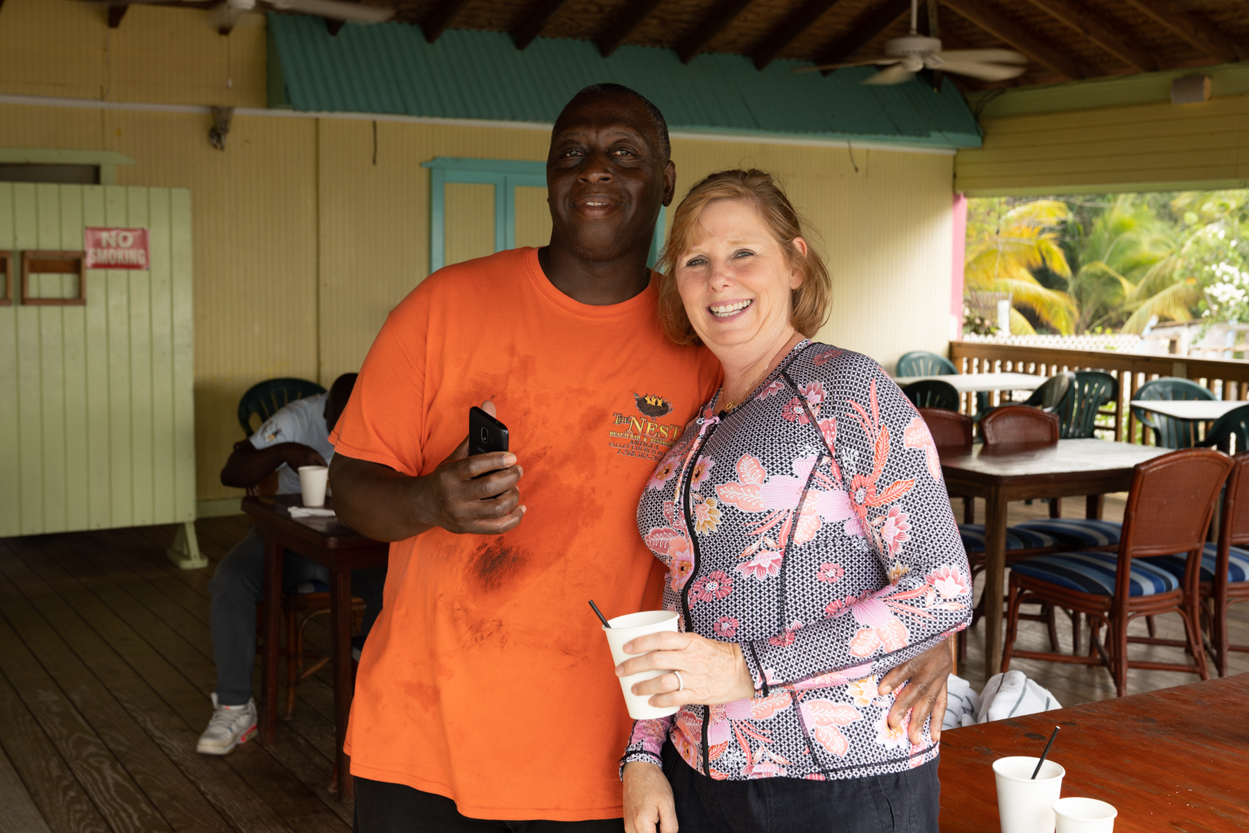 Andrea with the bartender of The Nest Beach Bar.