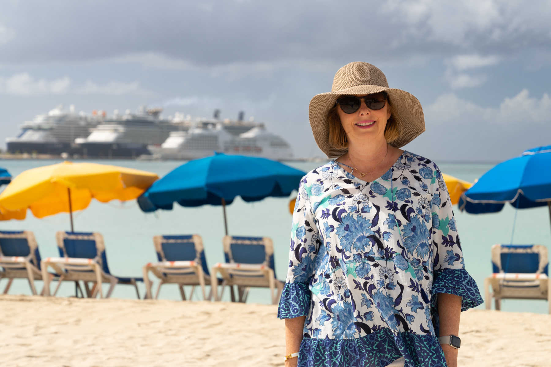 Andrea, on the Boardwalk in Sint Maarten (with our ship and two Celebrity cruise ships in the distance.