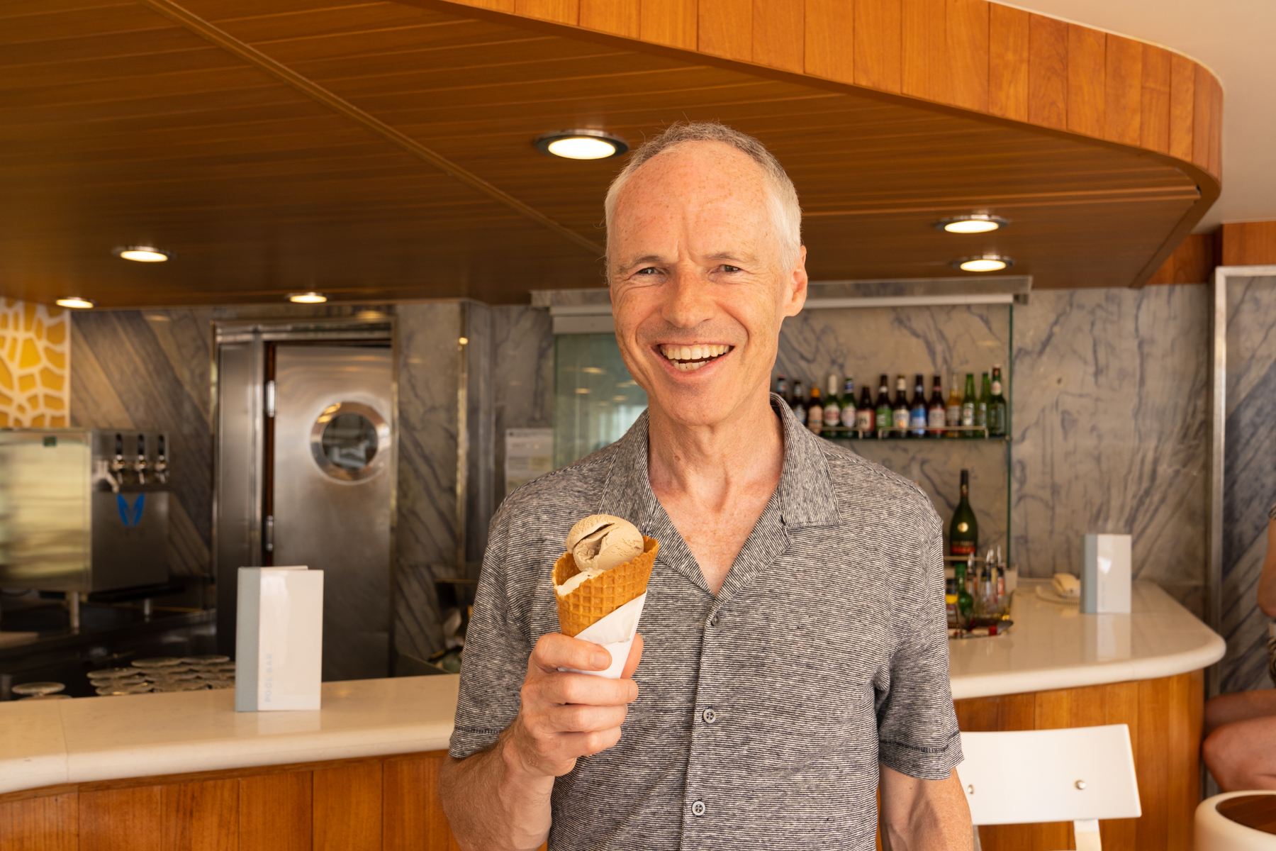 Keith enjoying an ice-cream.