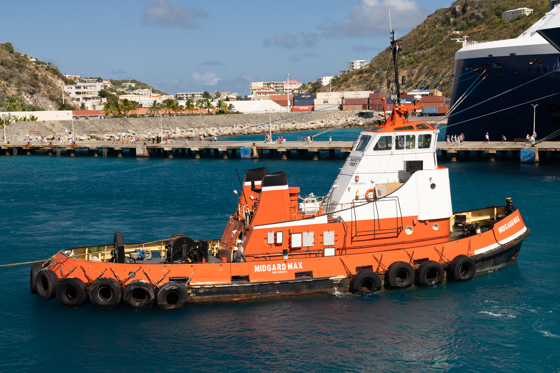 A tug pulling the bow of our ship.