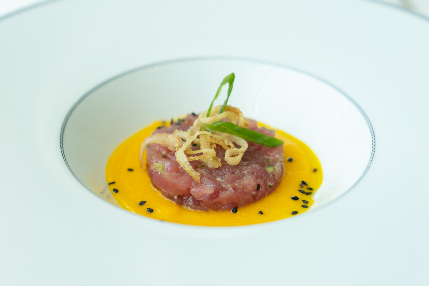 Tuna tartar with mirin soy, and ginger and carrot dressing.