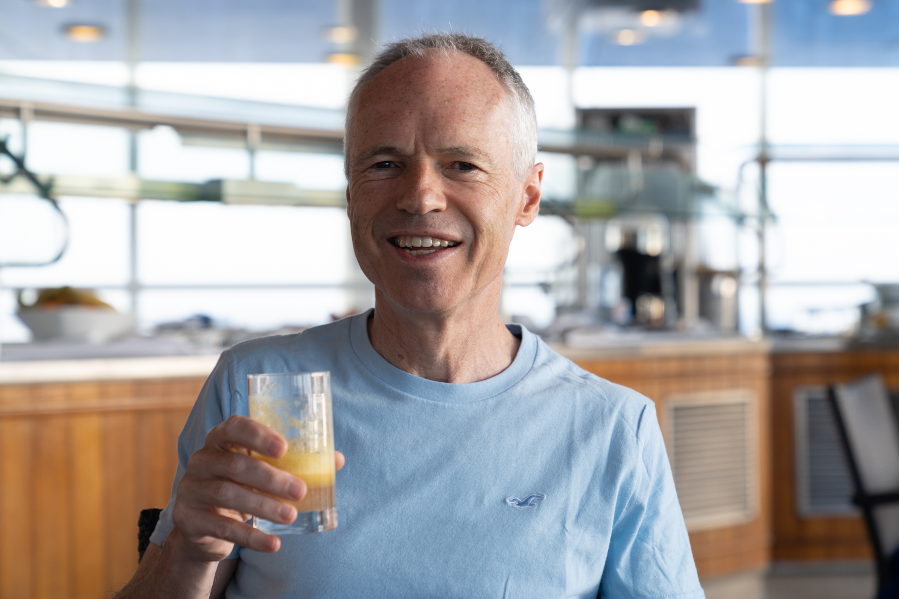 Keith enjoying a fresh juice (of pineapple, apple, orange, lemon, and ginger).
