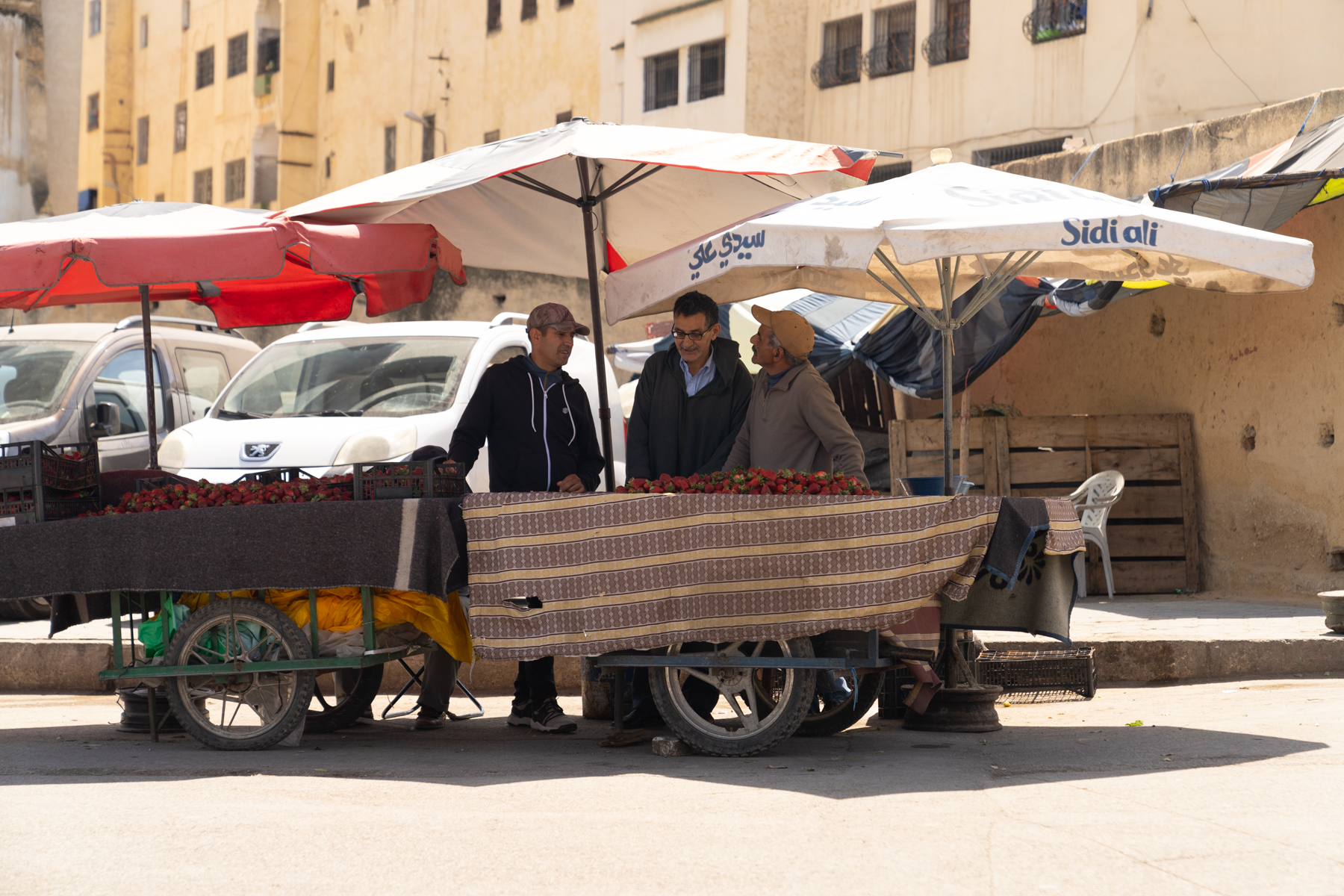 Strawberry vendors.