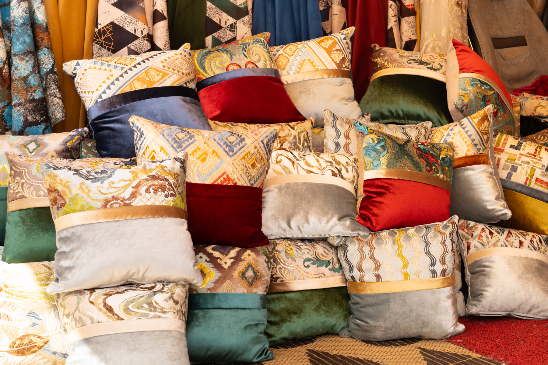 Cushions and fabrics for sale.