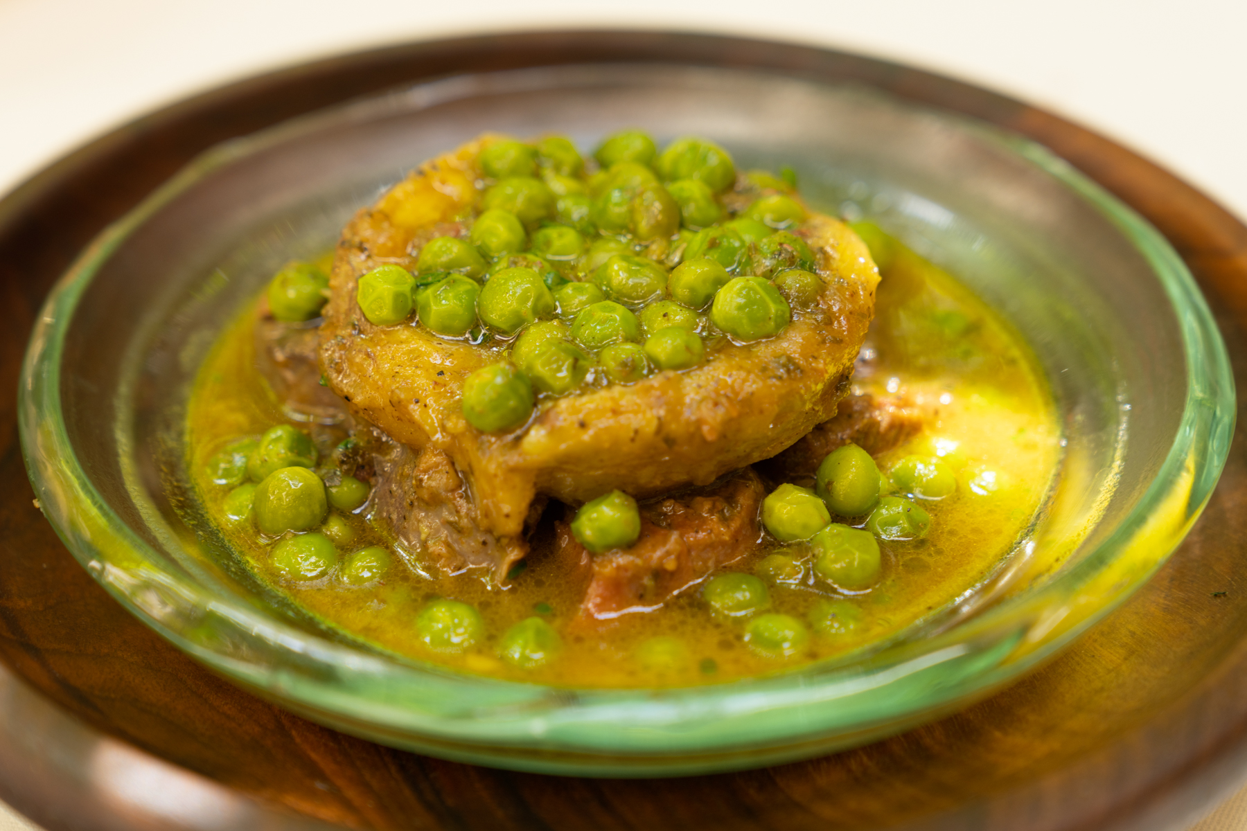 Traditional beef tagine with artichoke and peas.