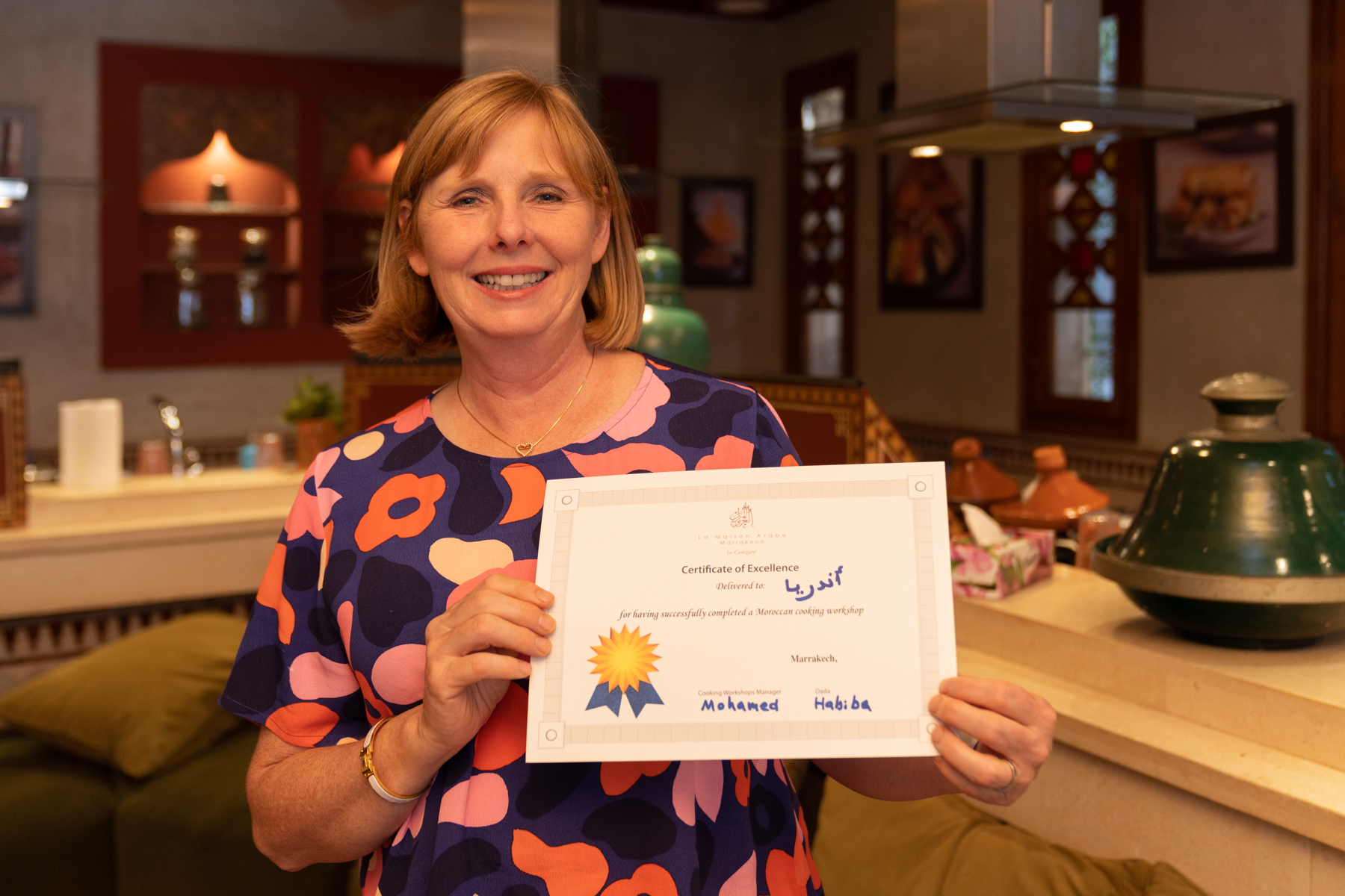 Andrea with proof of now being a certified Moroccan chef. 