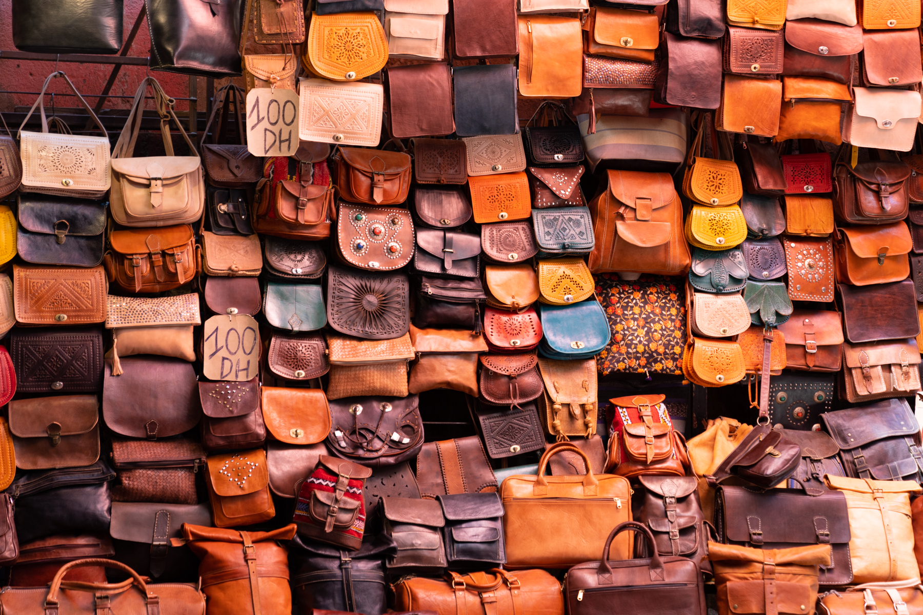 Leather handbags on display.
