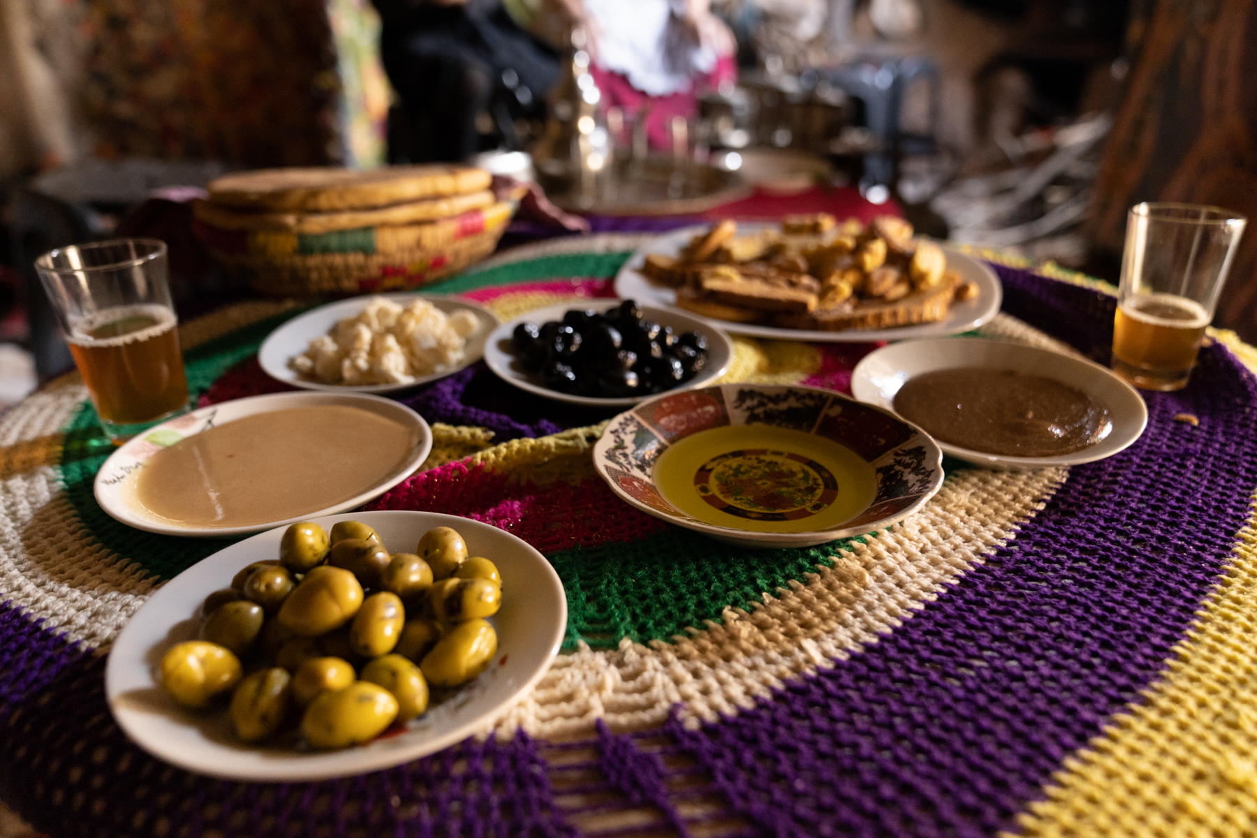 A traditional meal (including bread, olives, honey, biscuits).