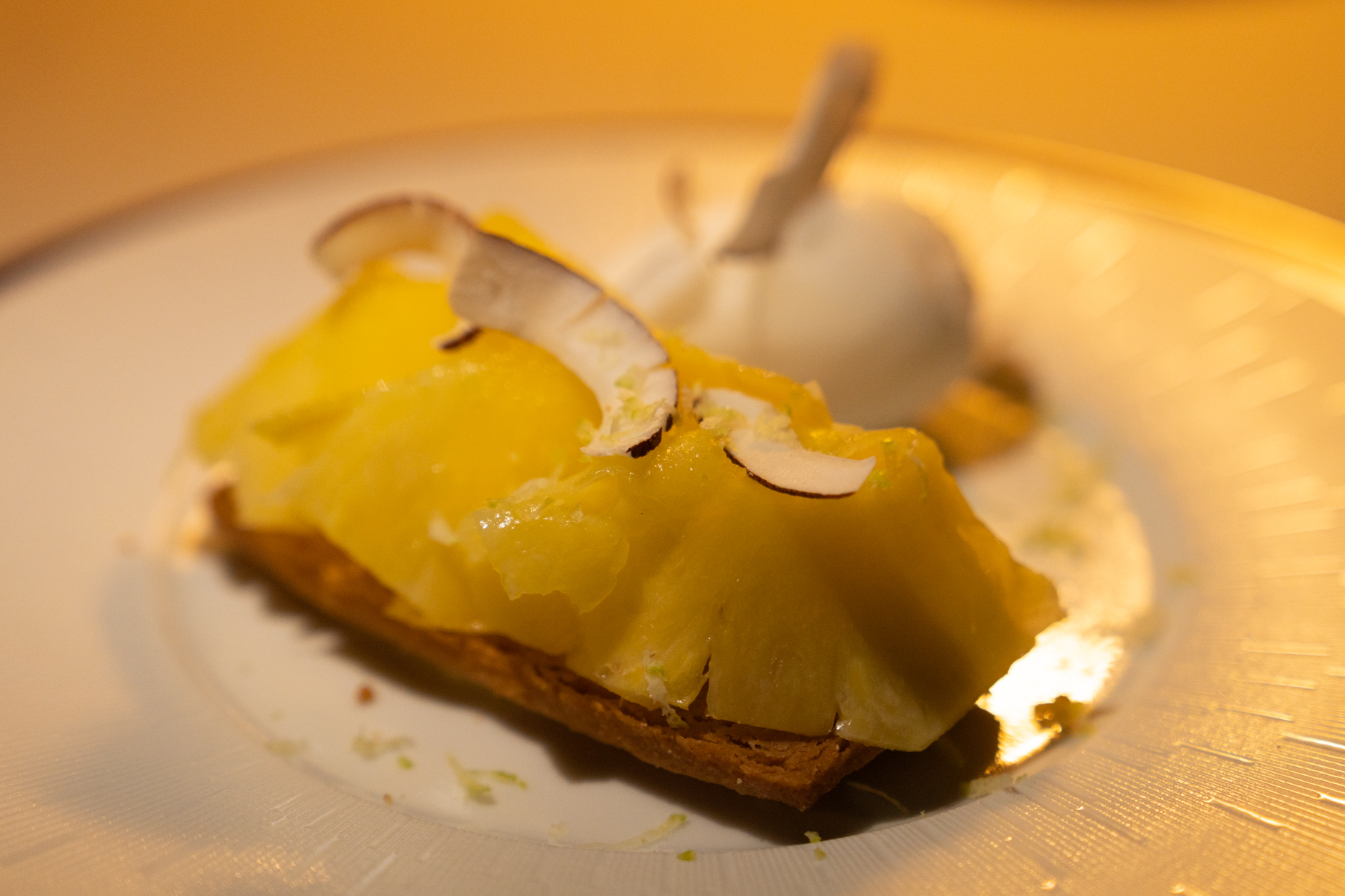 Tart of pineapple, coconut, and lime.