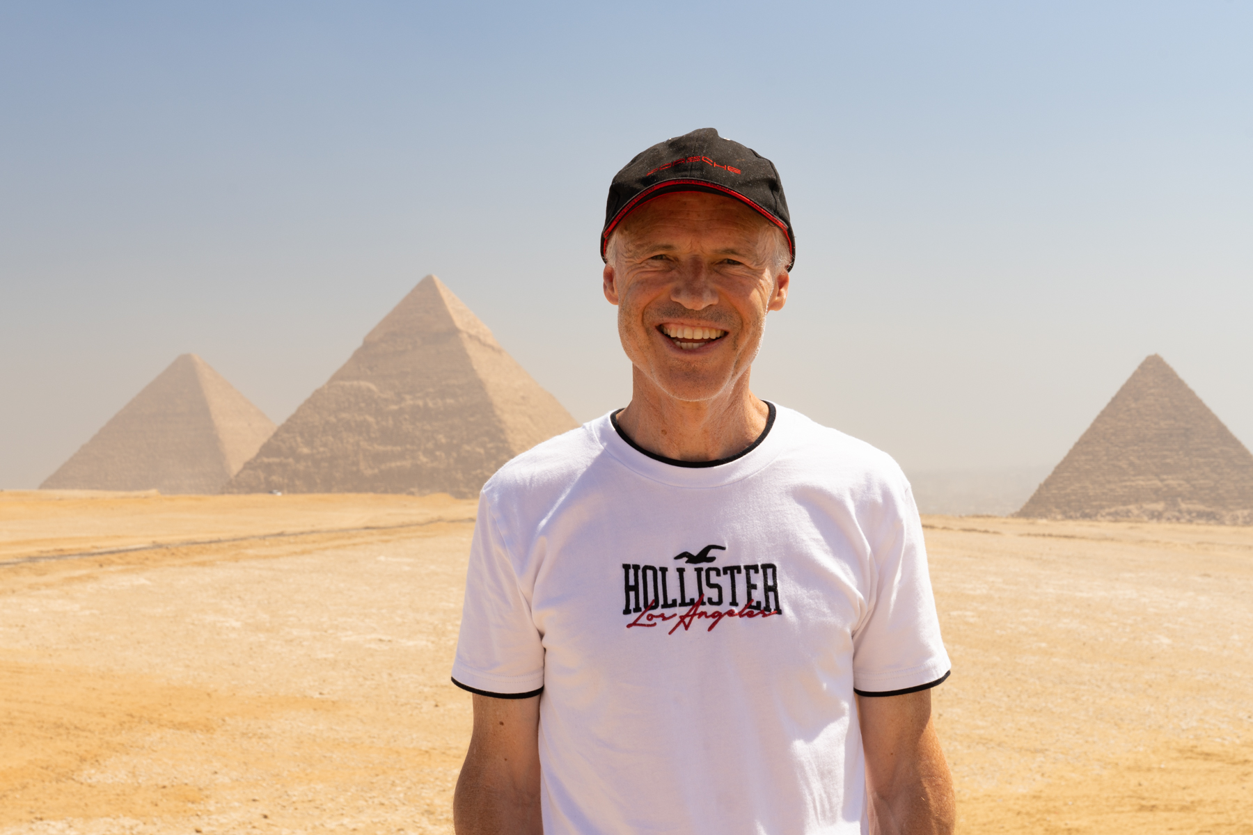 Keith with the three main pyramids at Giza in the background.