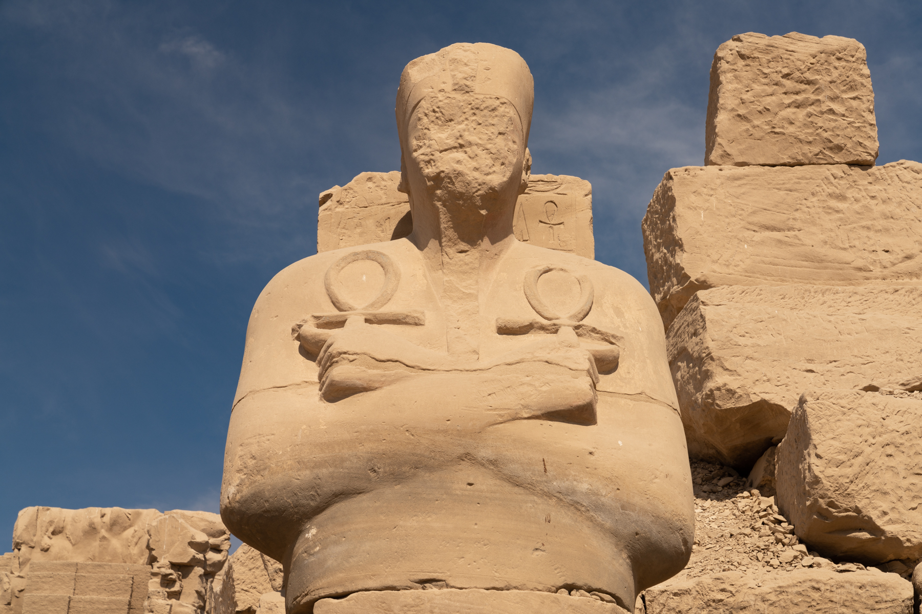 Statue of an unknown pharaoh holding the keys of life.