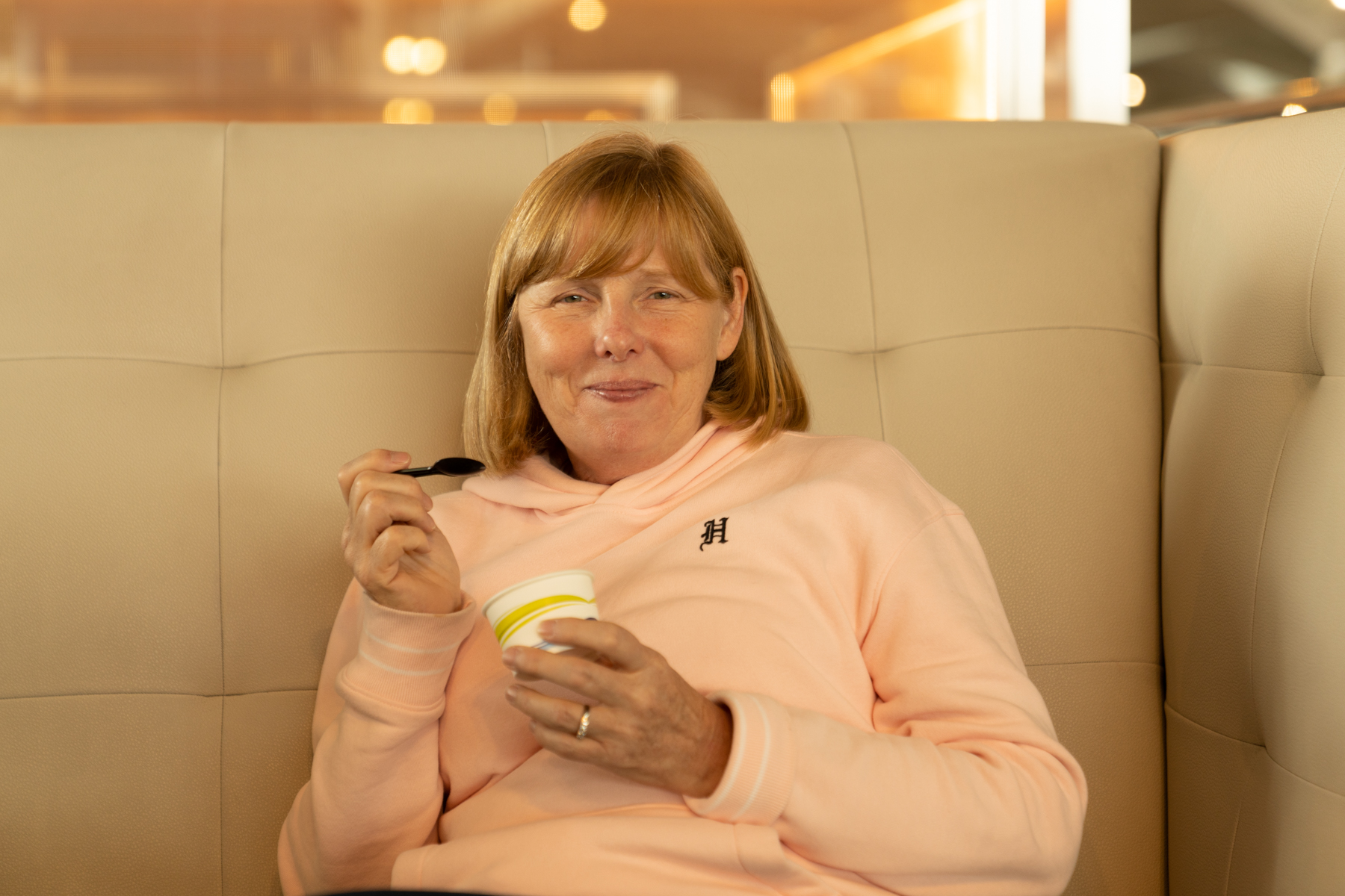 Andrea enjoying some ice-cream.