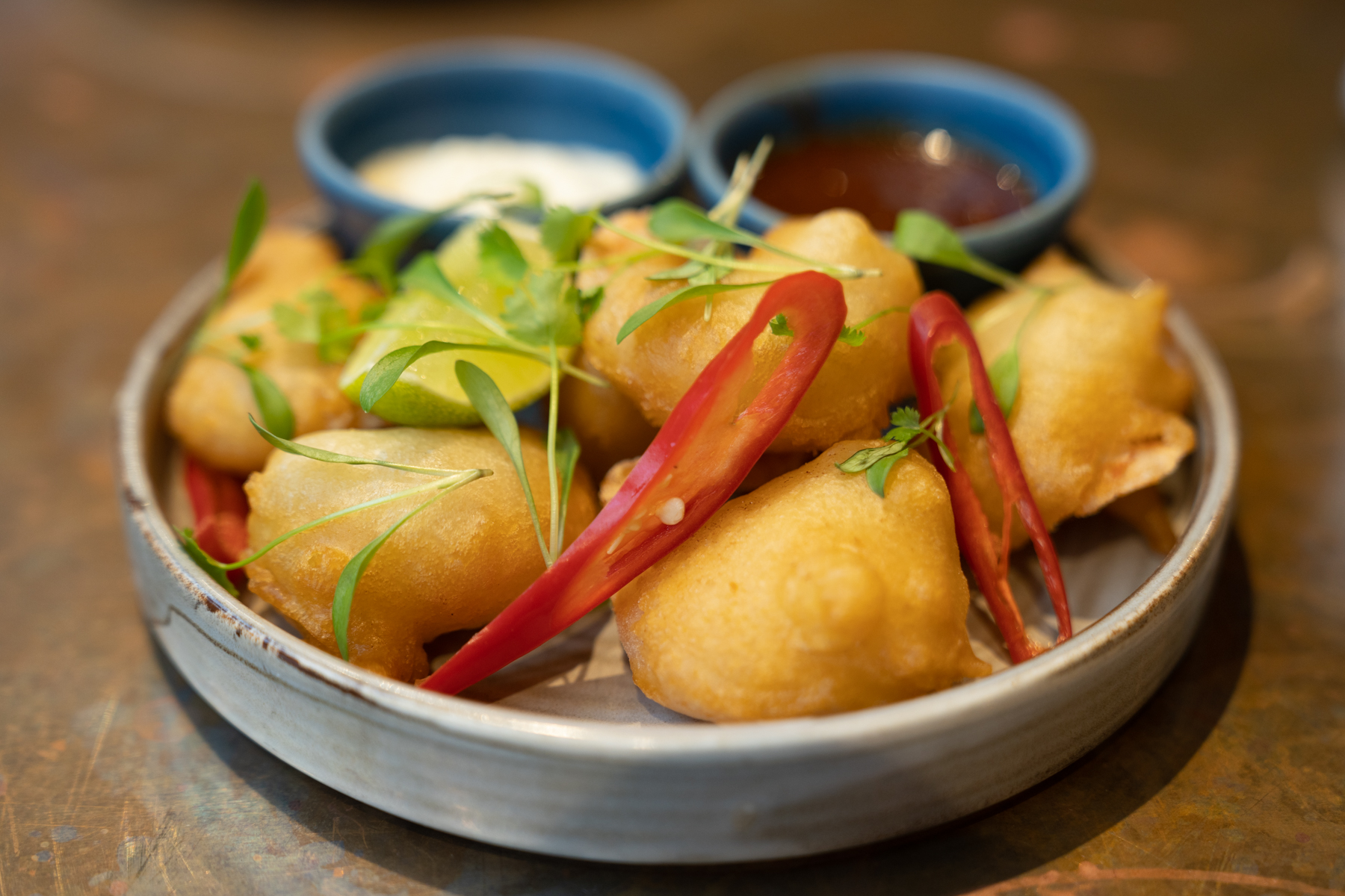 Gin and tonic battered tiger prawns.