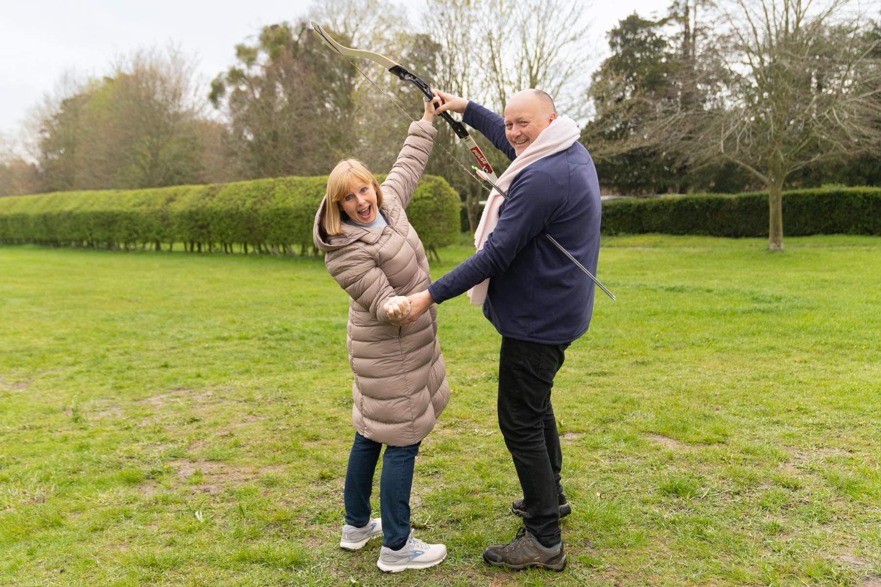 Andrea with our archery instructor, David.
