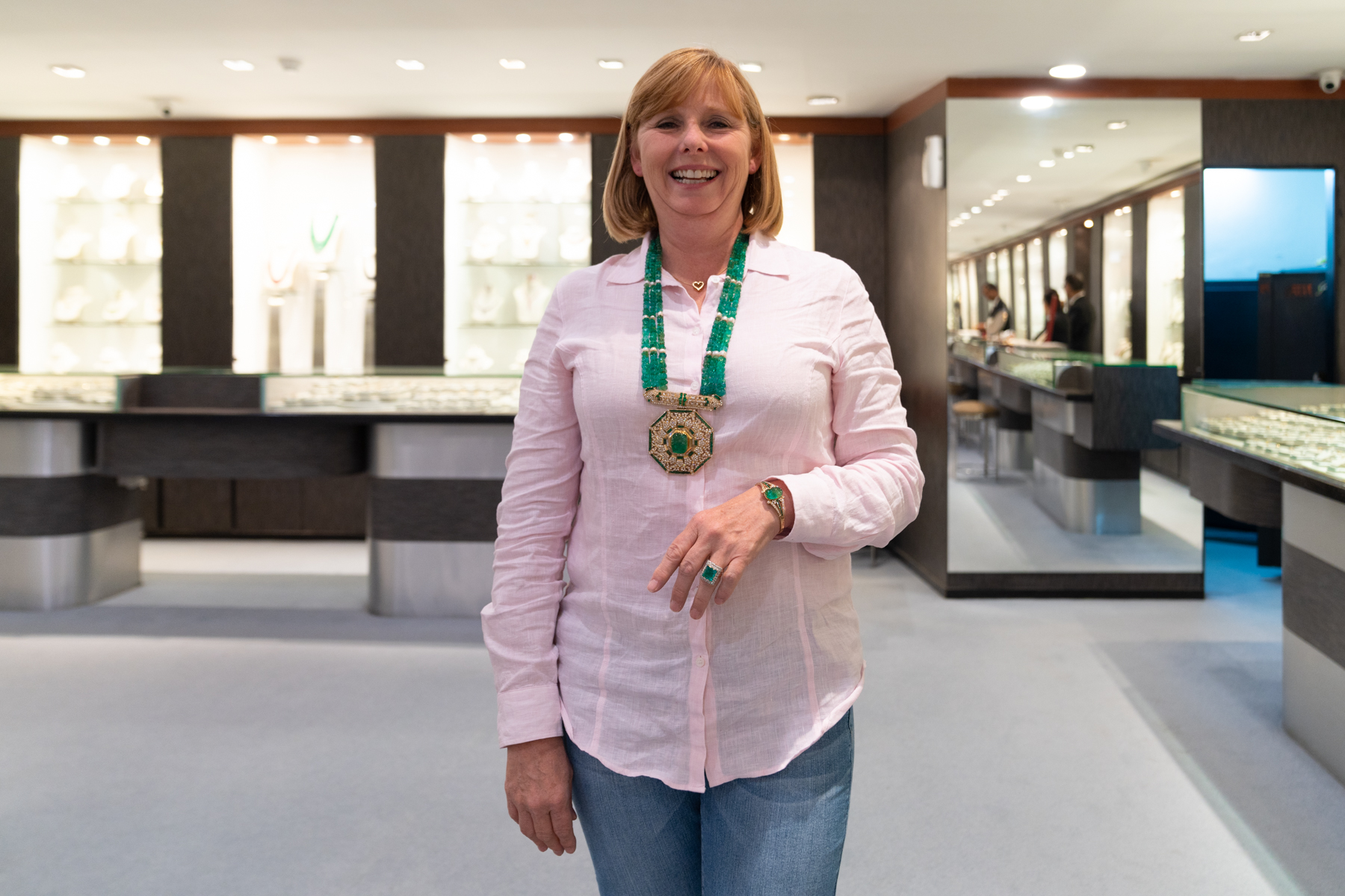 Andrea modelling emerald jewellery from the collection of Mumtaz Mahal.
