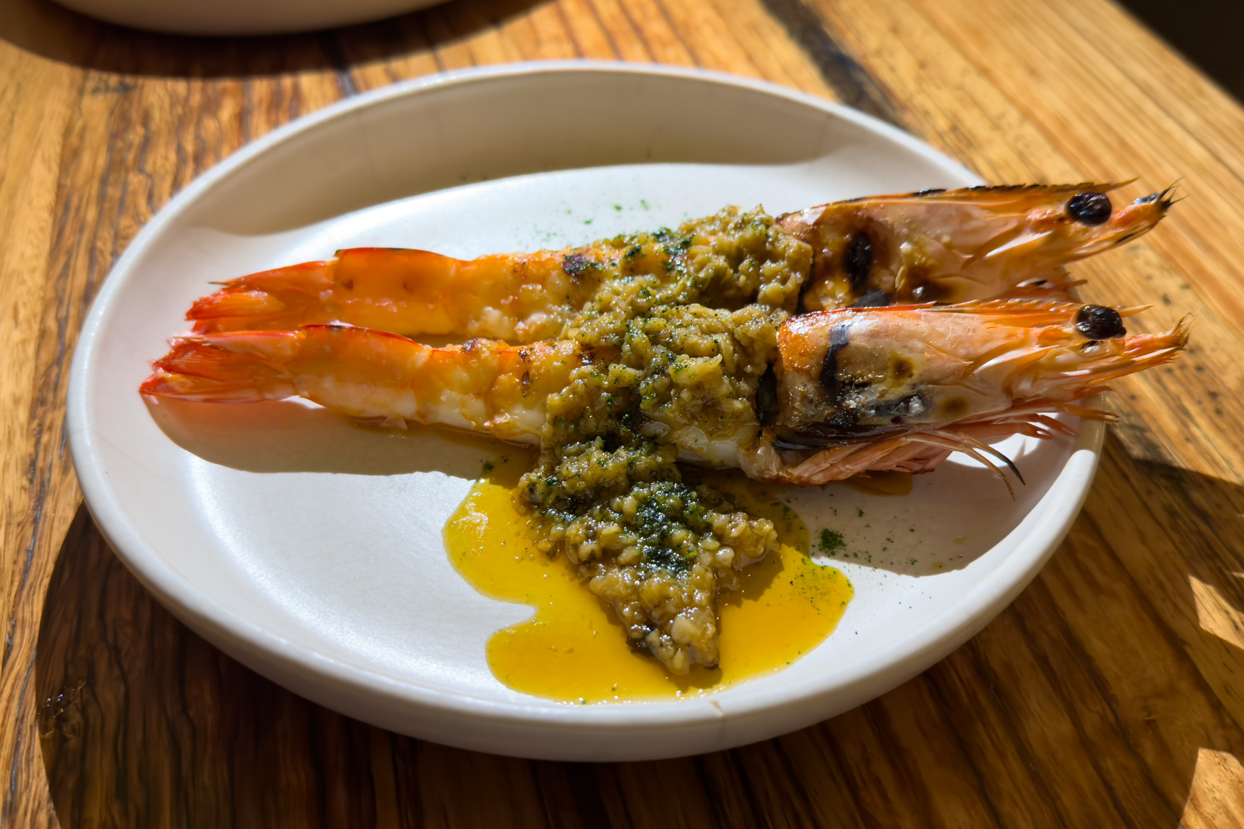 Grilled prawns with bay leaf butter.