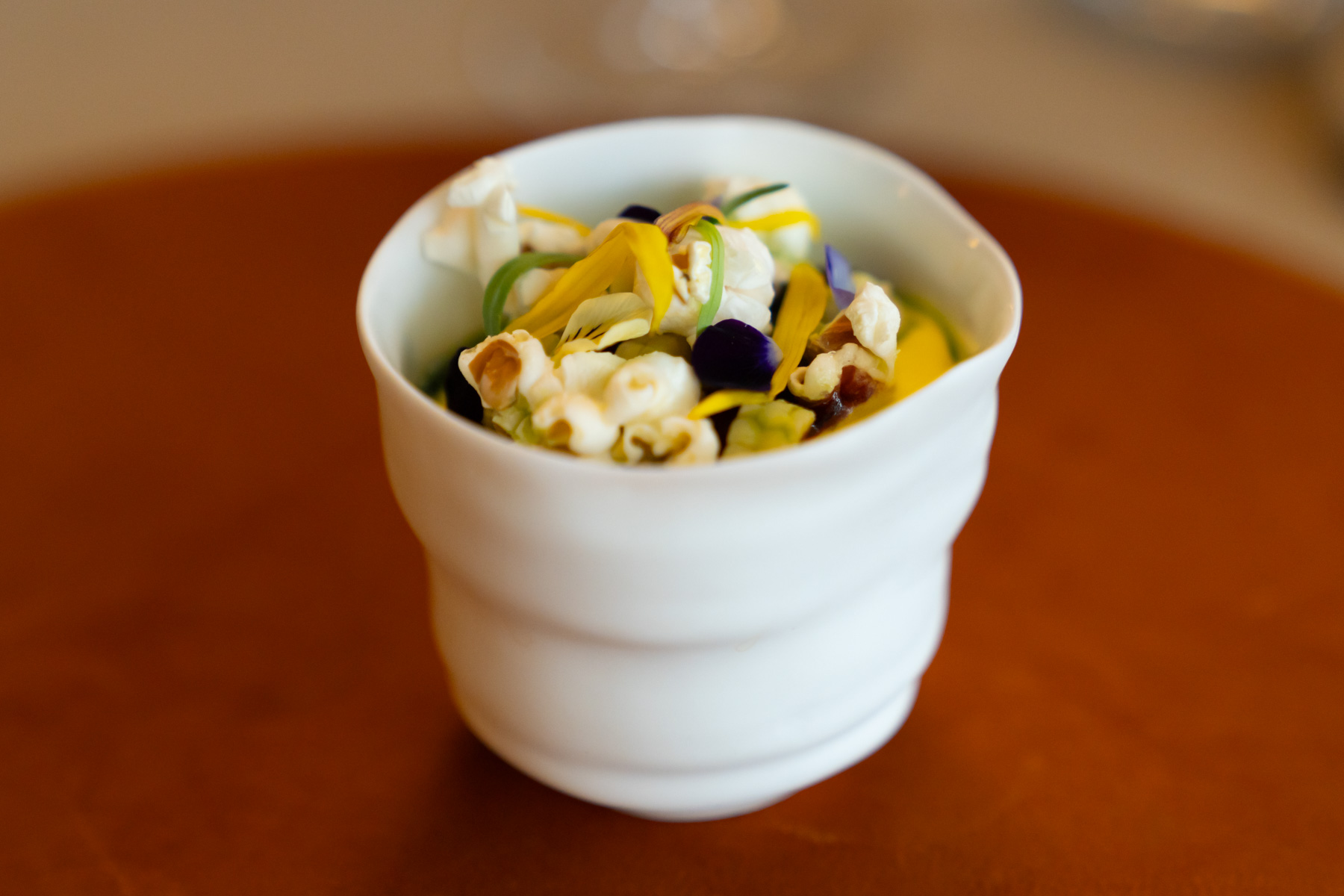 Purple corn pudding, sweetcorn mousse, sunflower seeds, tarragon.