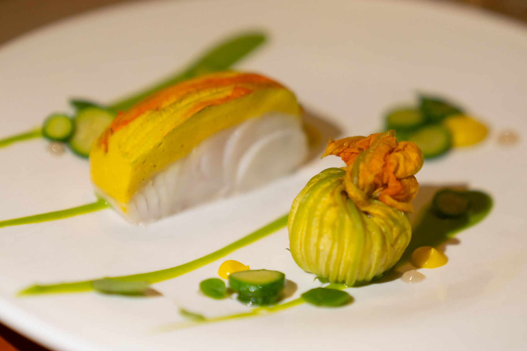 Steamed blue eye, zucchini flower, pickled clams, marjoram.