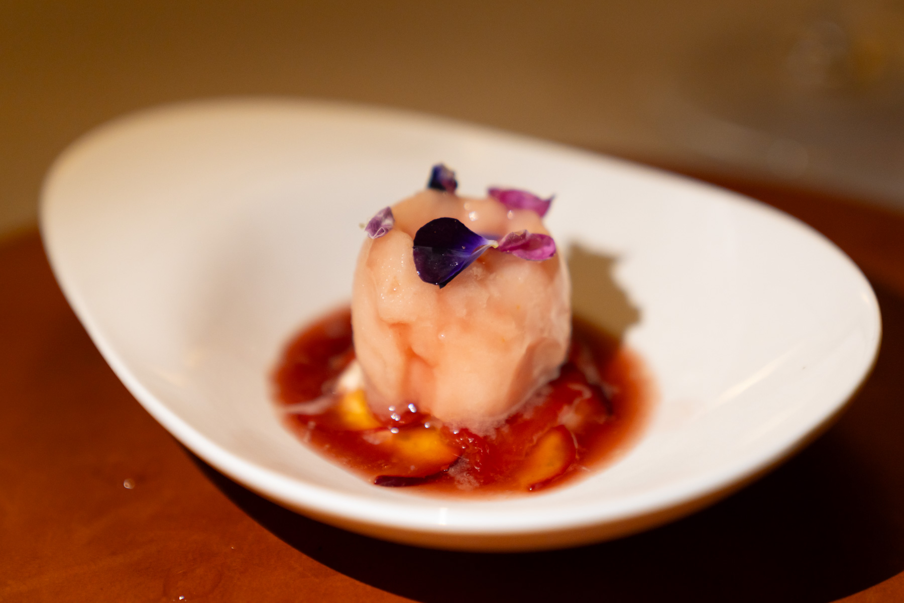 Compressed plum, tomato sorbet, quark, plum wine.