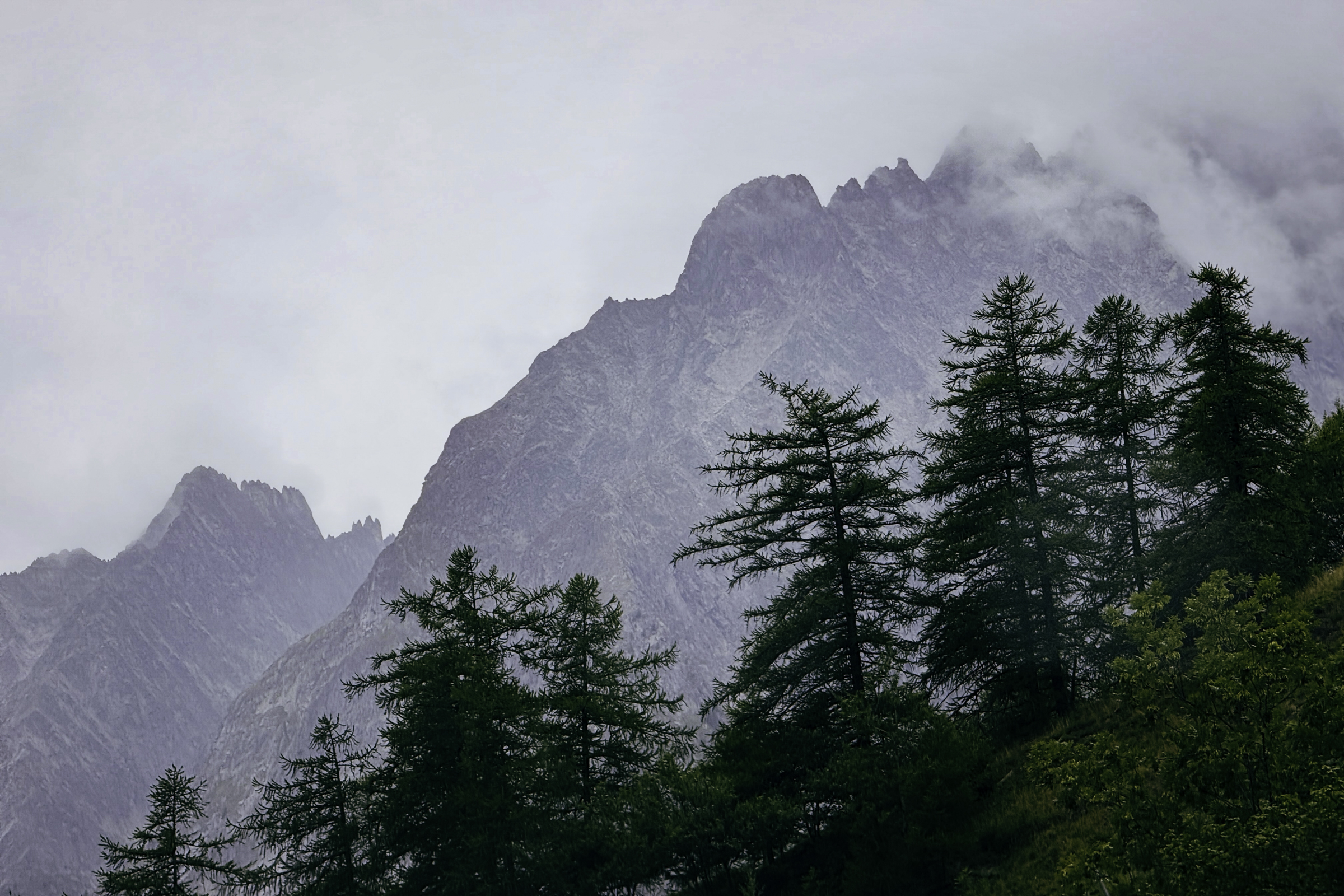 The jagged peak of Aiguille Noire de Peuterey, as seen from the road on the the Italian side, near Courmayeur.