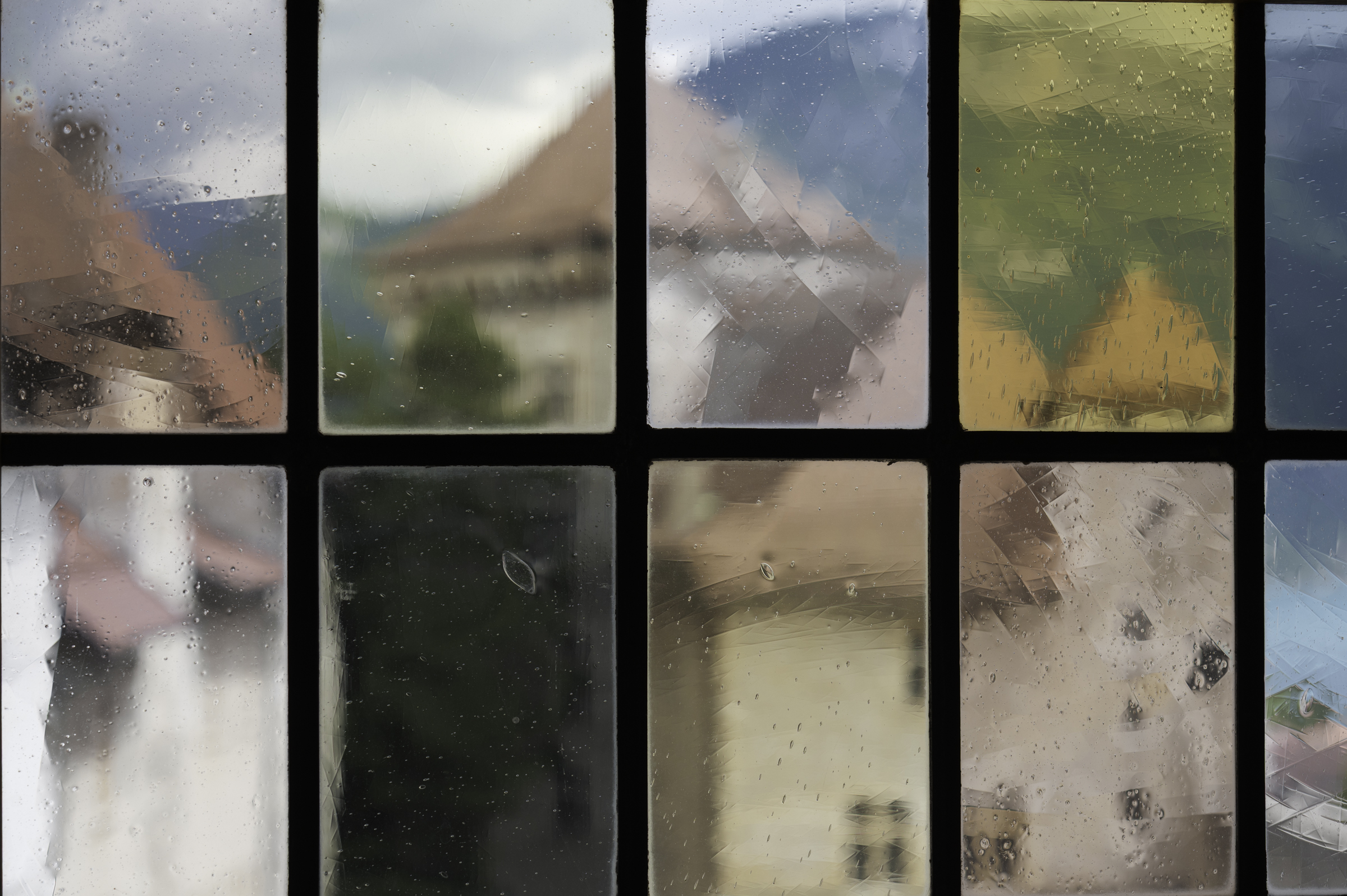 Looking through a stained-glass window at Annecy Castle.