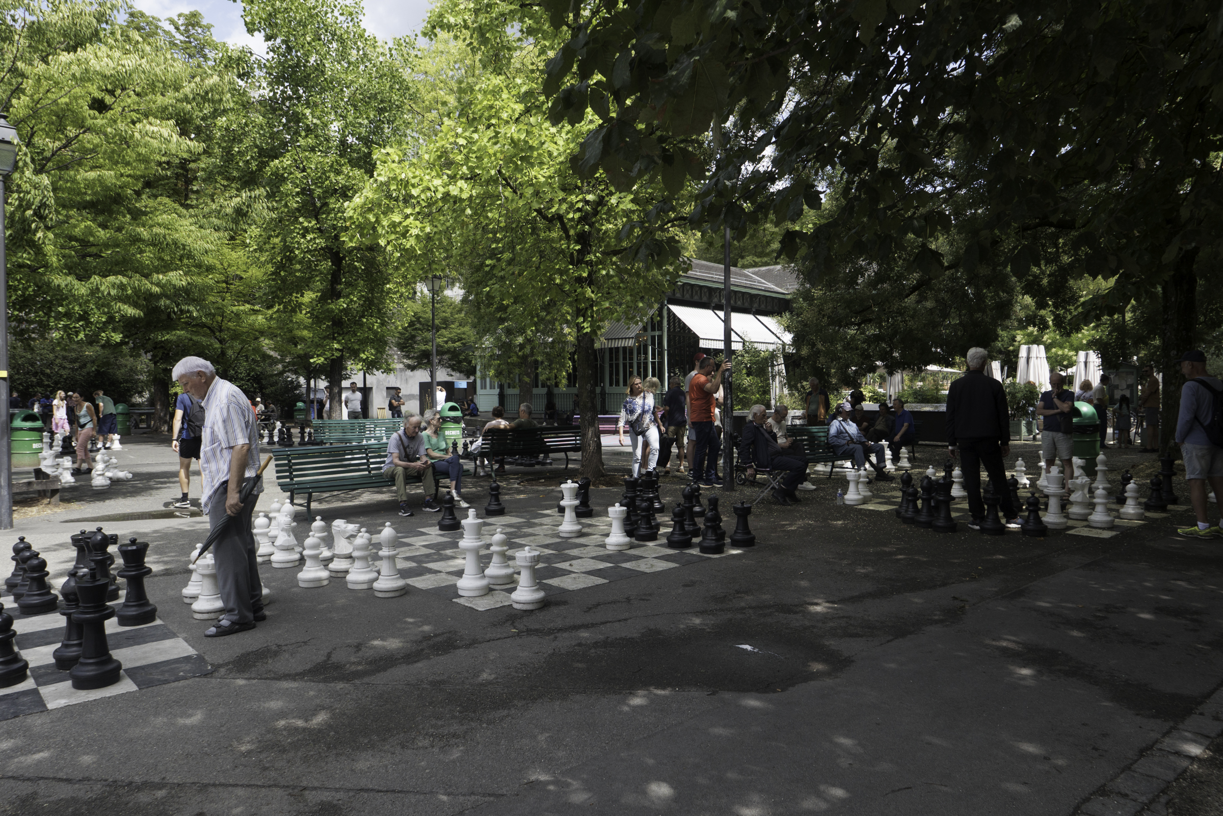 People playing chess in Parc des Bastions.