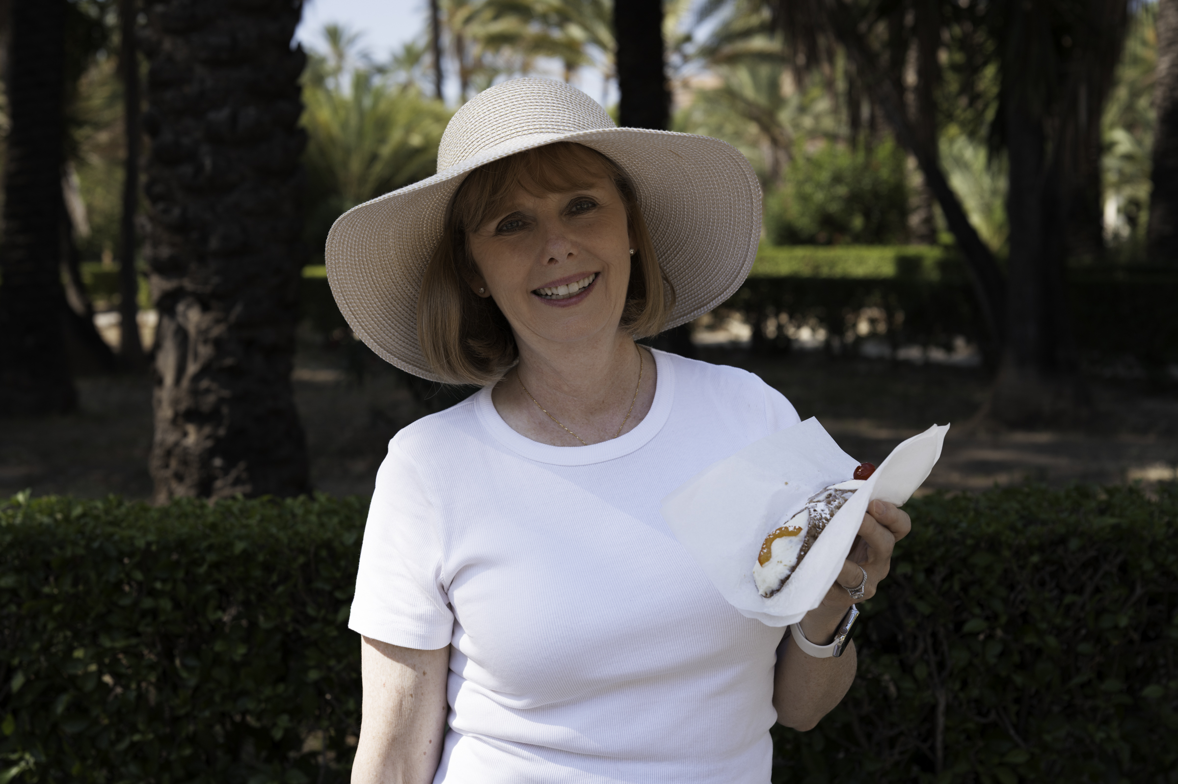 Andrea, in Fossa granaia, enjoying a cannolo.