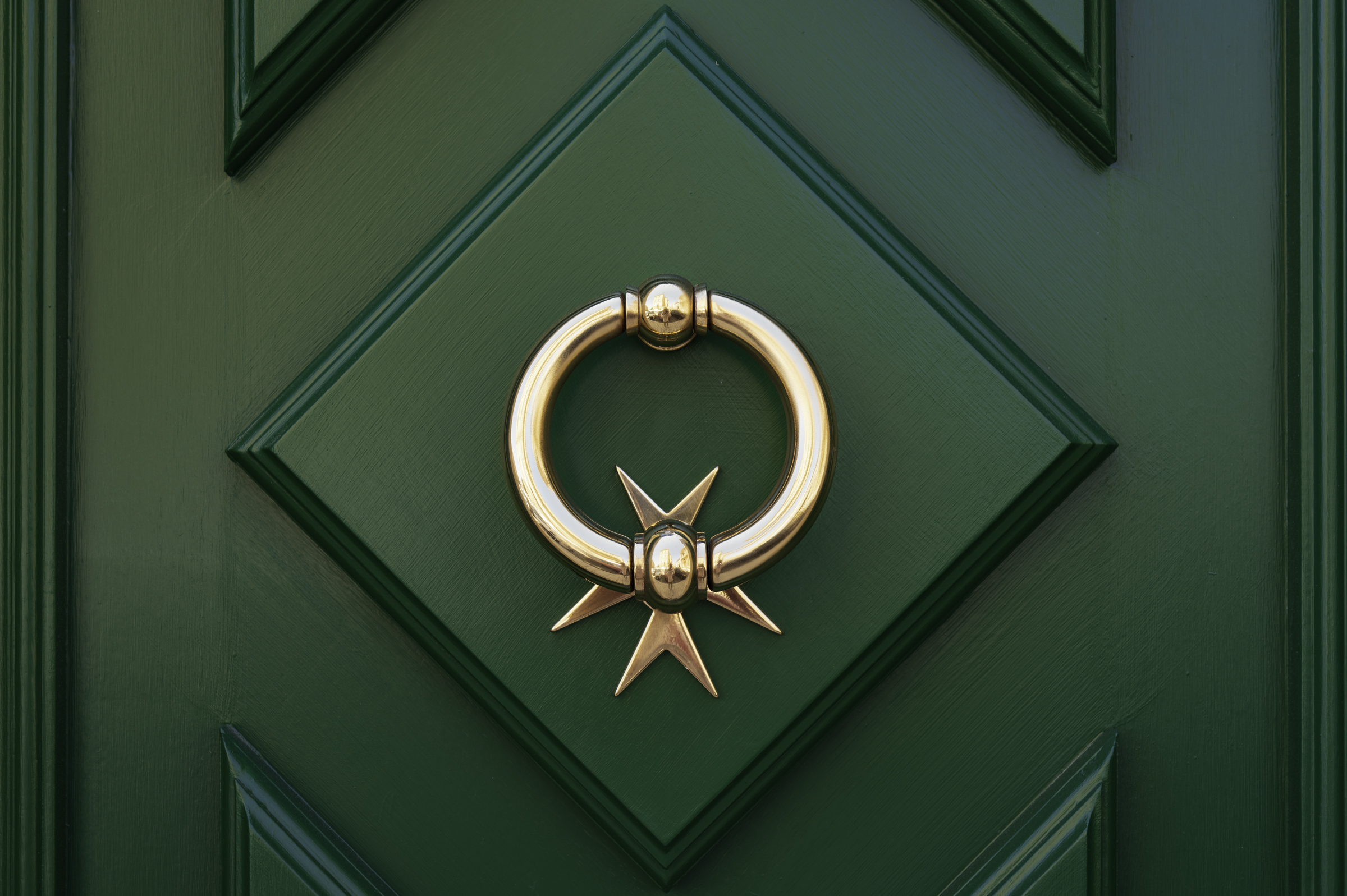 Decorative door knocker in Valletta.