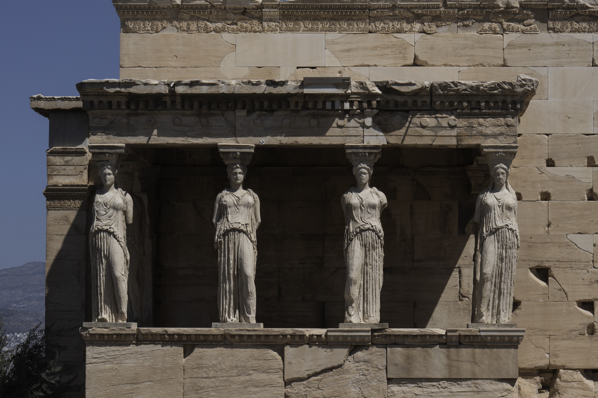 The iconic Porch of the Caryatids at the Erechtheion.