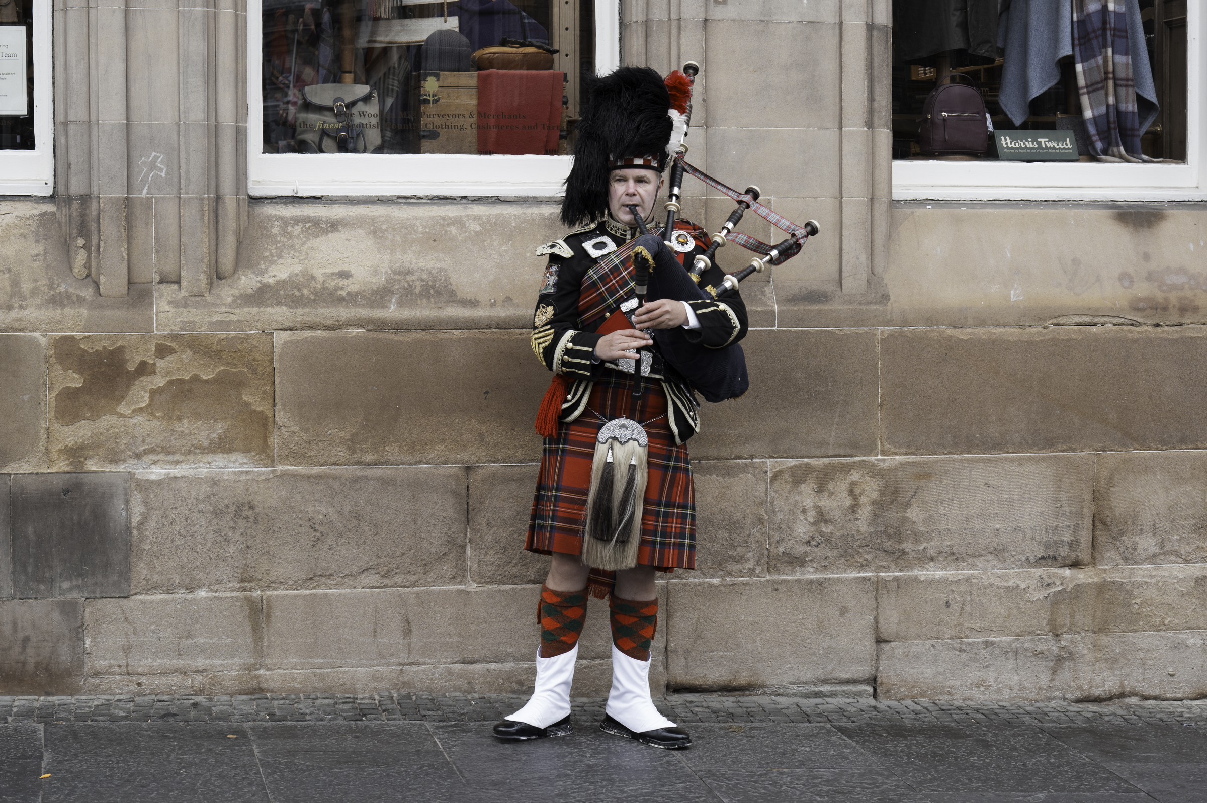A bagpiper on the Royal Mile.